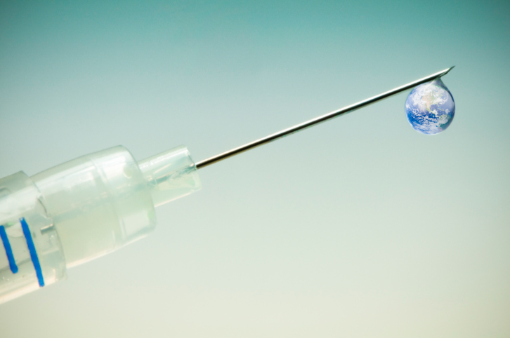 Shooting up earth, globe dripping out syringe (drugs medicine concept)
