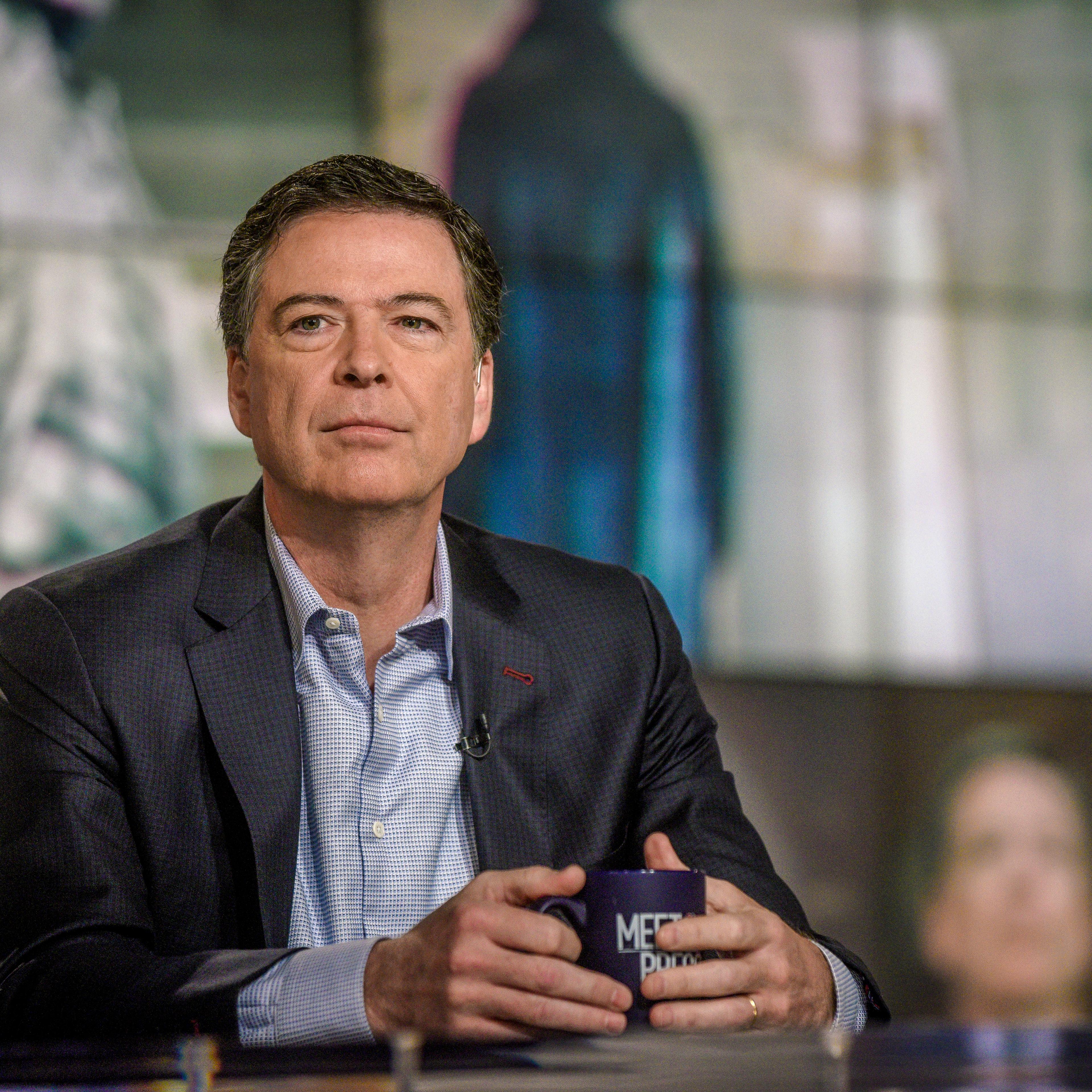 Former FBI Director James Comey sits on set at "Meet the Press"