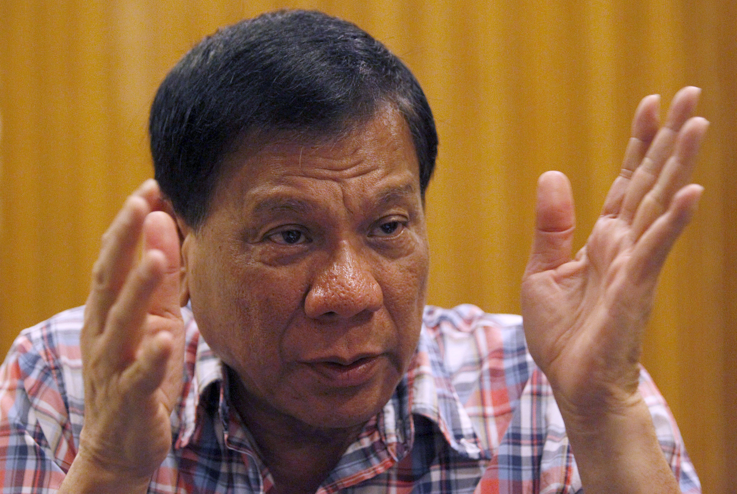Rodrigo Duterte, the seven-term mayor of Davao city who has built a reputation for fighting crime in the insurgency-plagued south, gestures during an interview in Manila, Philippines, Dec. 10, 2015. The presidential hopeful stuck to his guns on April 17,