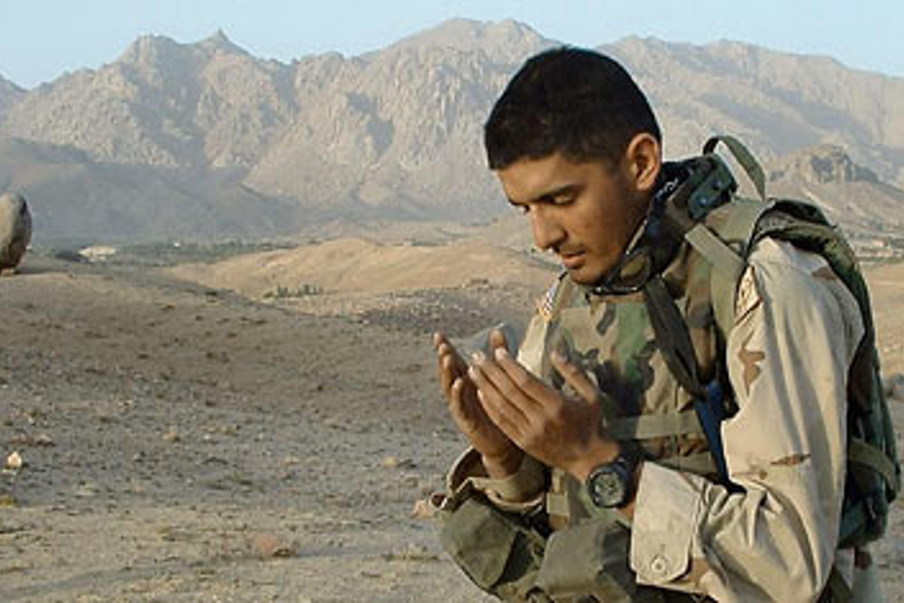 U.S. Army specialist Zia Ulahaq, a Muslim, offers prayers during anti-Taliban operations in the Karky valley in Afghanistan's Zabul province