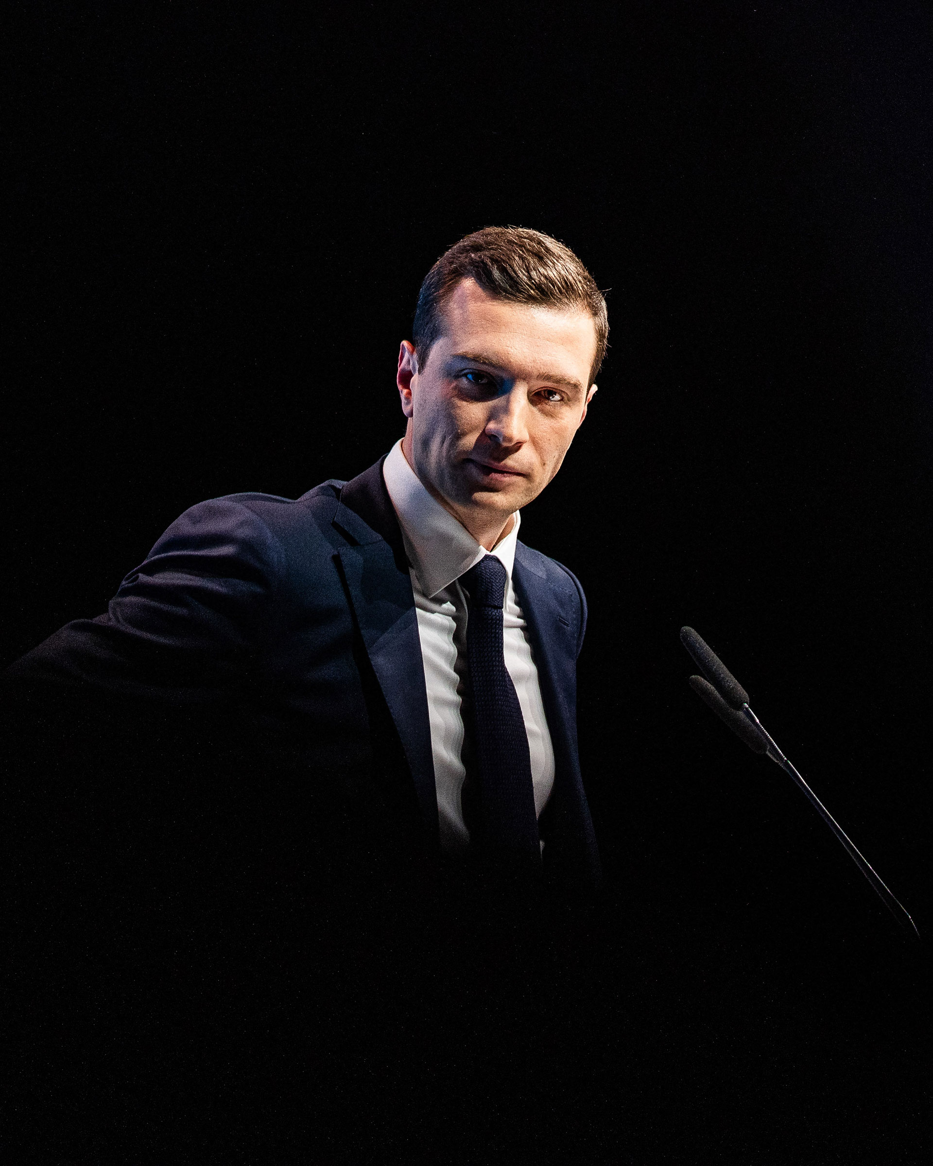 Jordan Bardella during his speech on stage at the Grand Meeting at the Palais des Congres in Perpignan, France, on May 1, 2024.