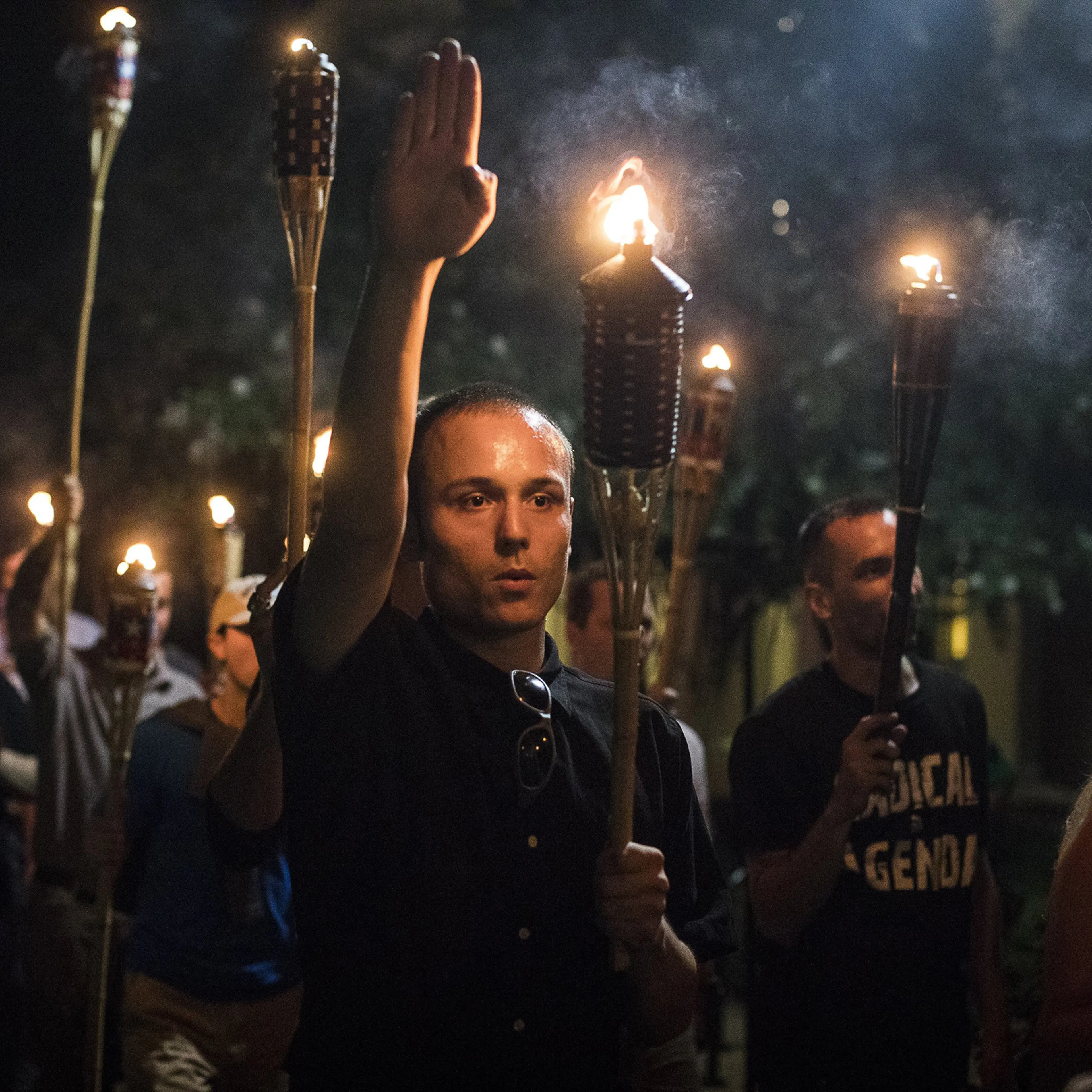 White nationalists bearing torches converge on the grounds of the University of Virginia in Charlottesville on Aug. 11