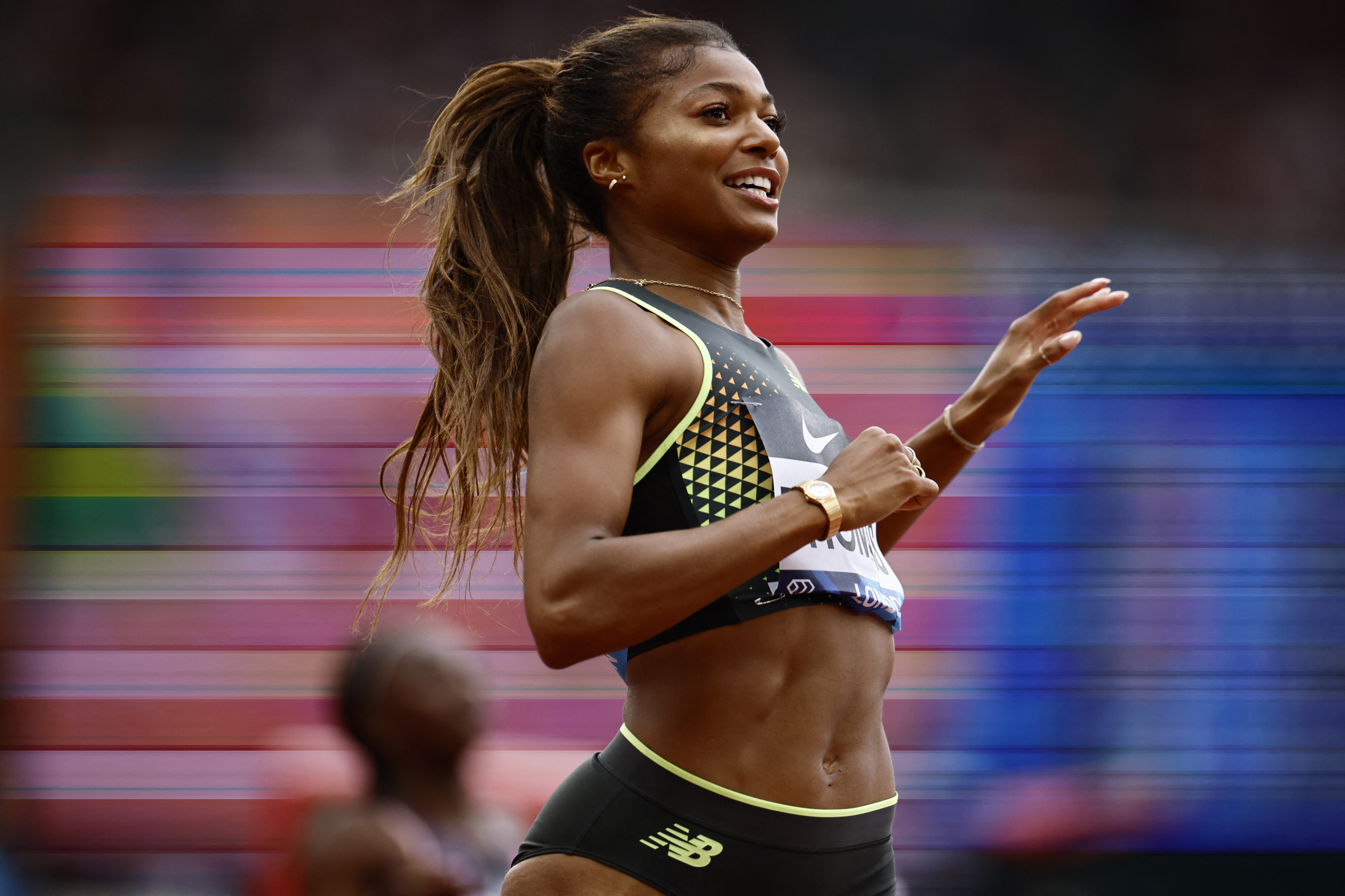 USA's Gabby Thomas celebrates after winning the Women's 200m event during the IAAF Diamond League athletics meeting at the London stadium on July 20, 2024.