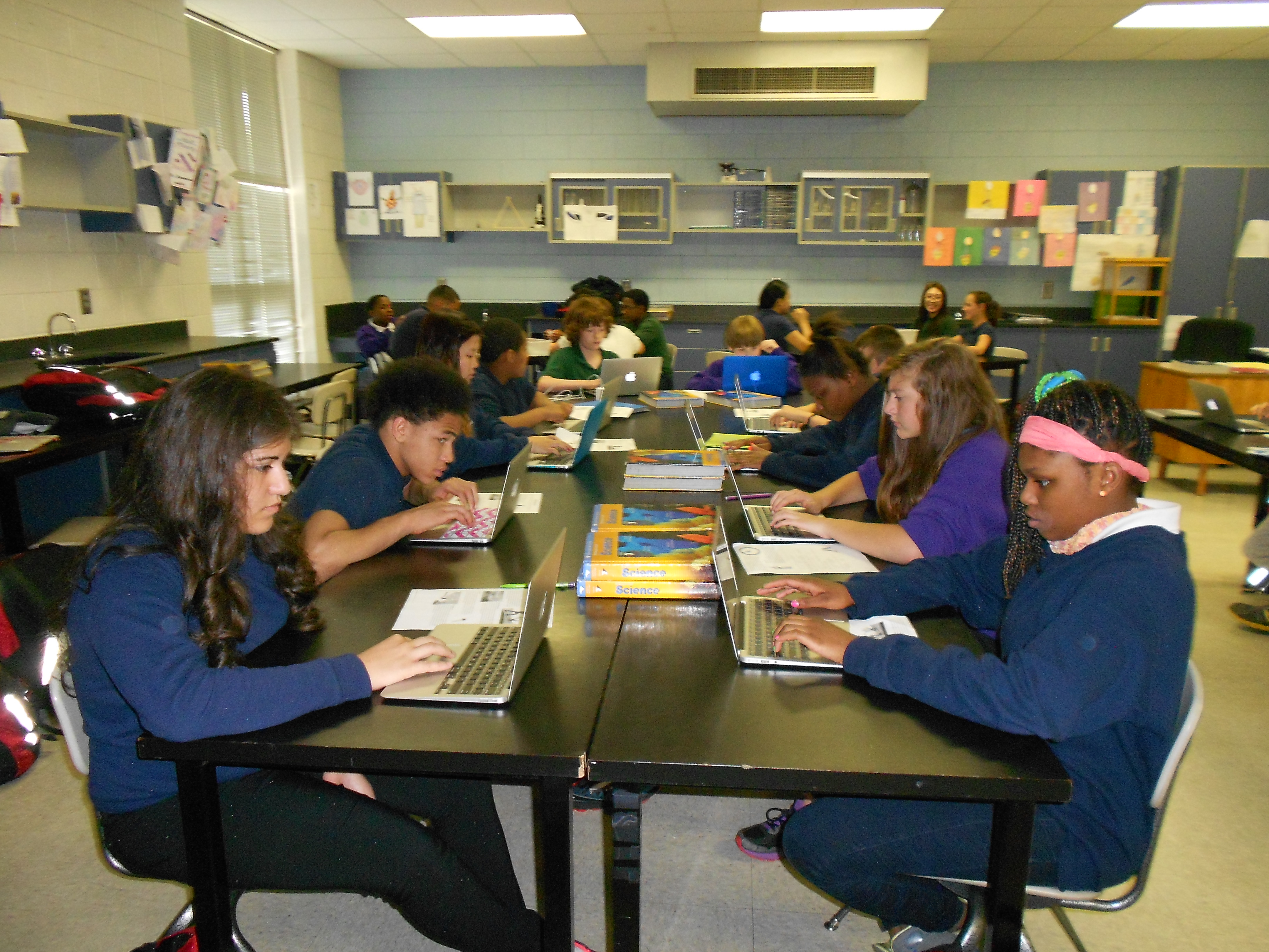 Students work on MacBook Air laptops in science class at East Iredell Middle School in Statesville, N.C. on May 19, 2014. 