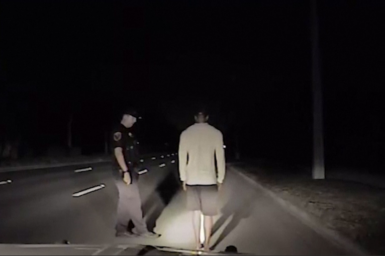 A still image taken from the dash cam as officers conducted a field sobriety test for Tiger Woods in Jupiter, Fla., on May 29, 2017.