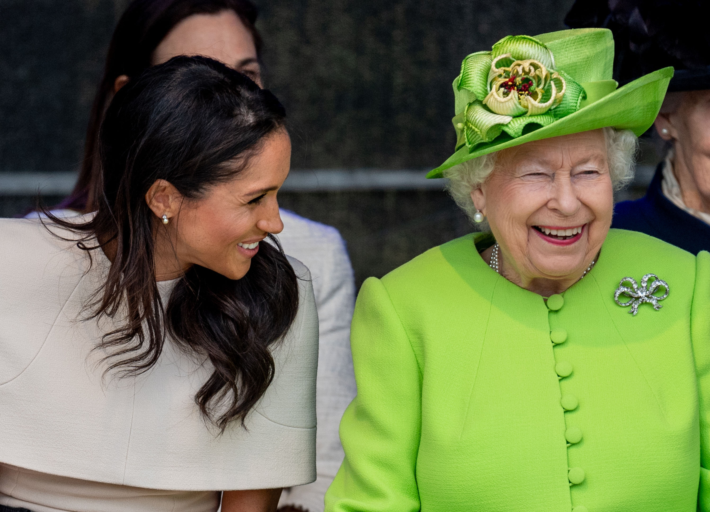 Duchess of Sussex and Queen Elizabeth laugh in photo