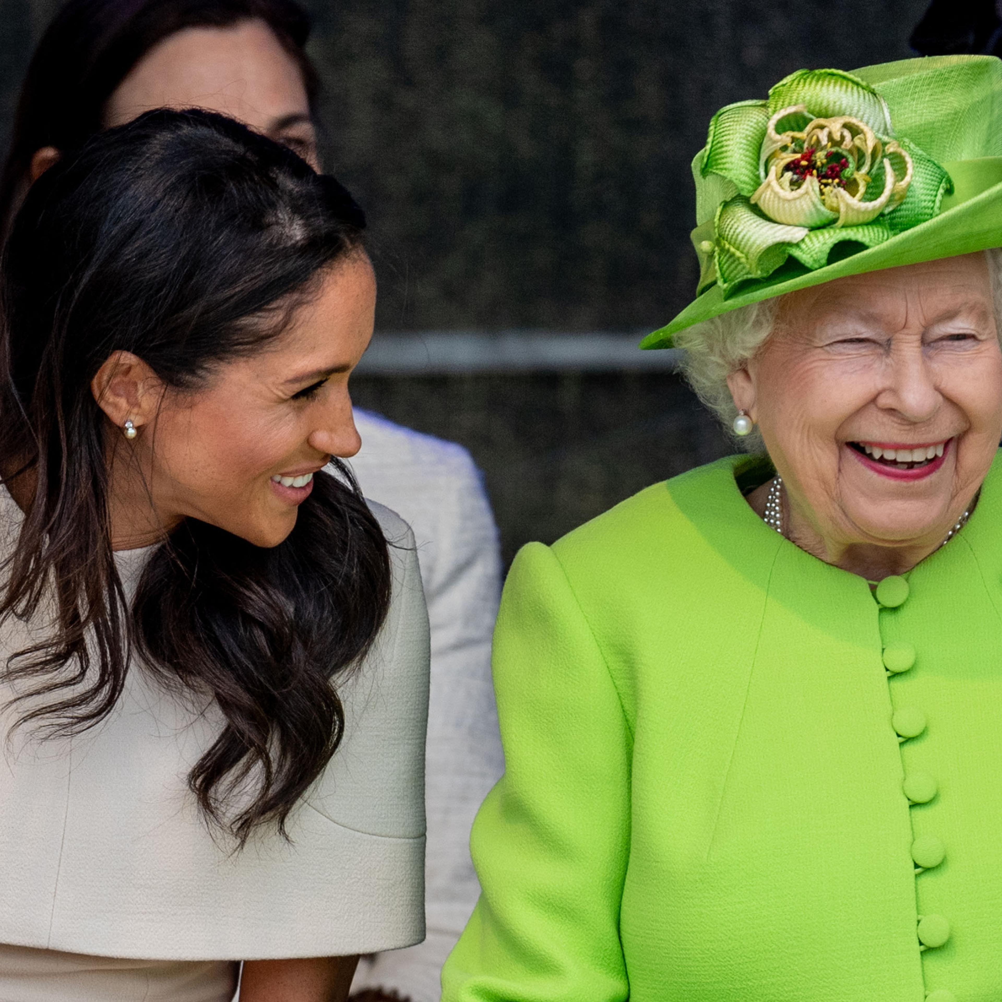 Duchess of Sussex and Queen Elizabeth laugh in photo