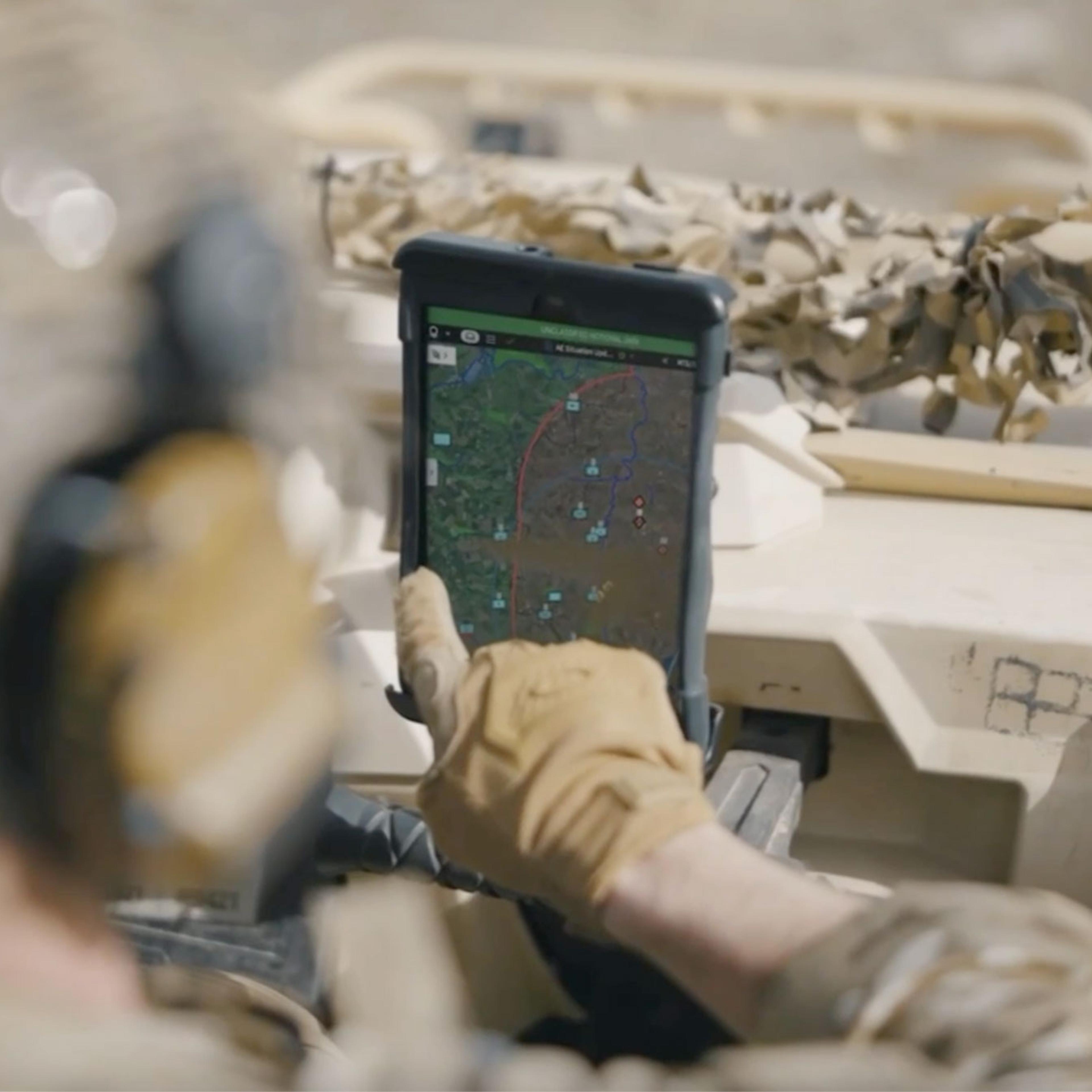 A soldier uses Palantir technology for battlespace awareness & planning.