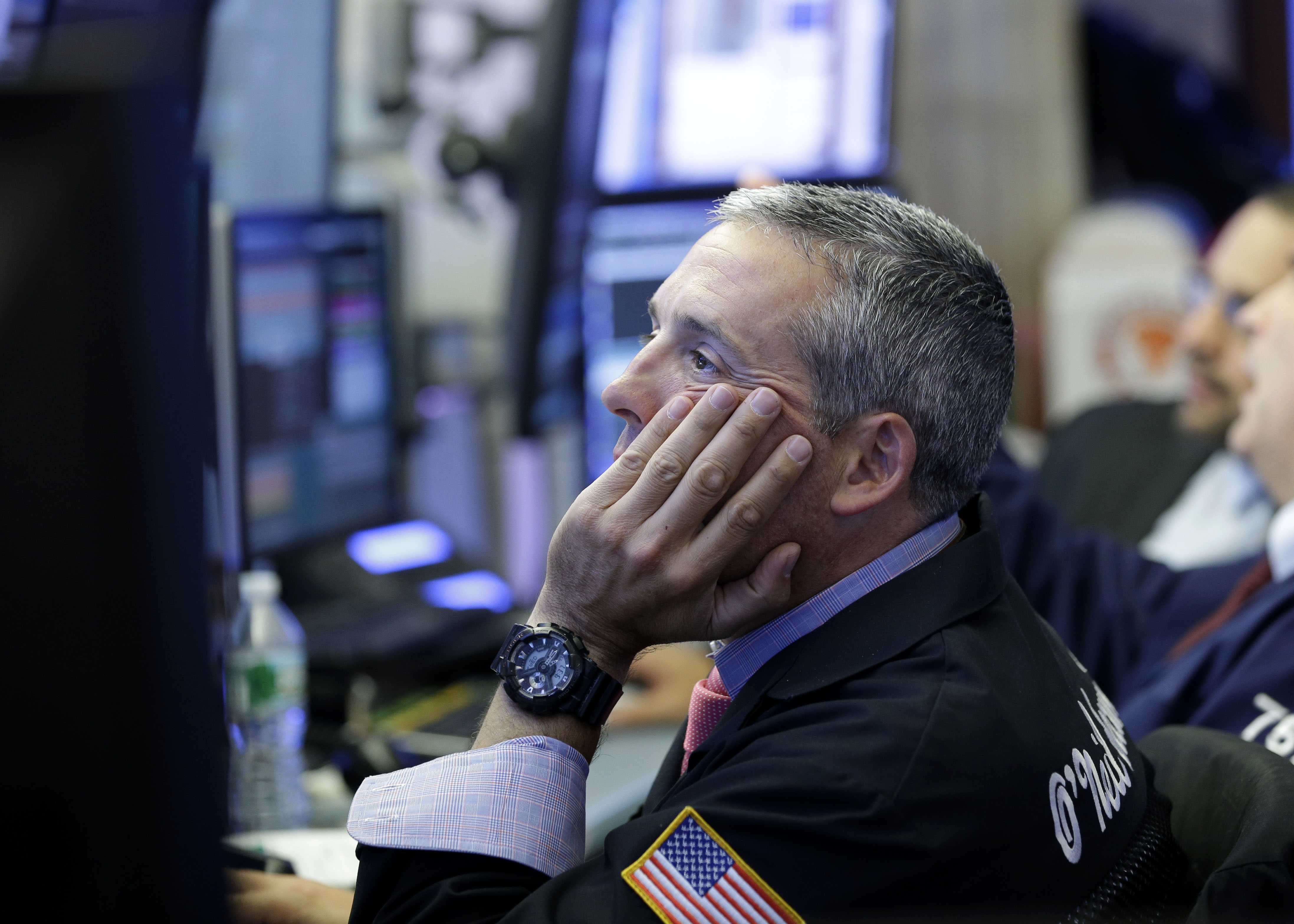 A trader on the floor at the New York Stock Exchange in New York City on July 8, 2015.