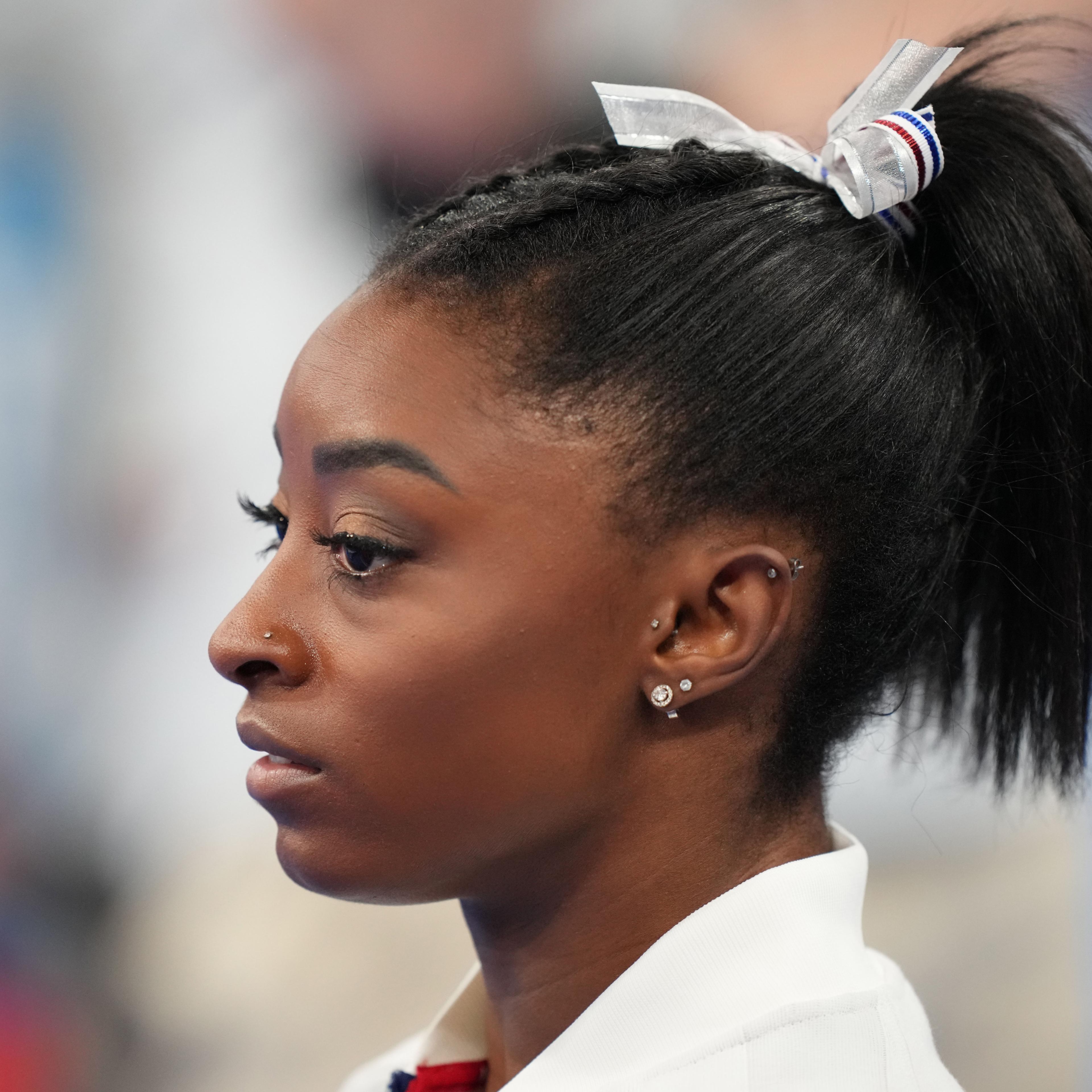 Simone Biles of Team US reacts during the Women's Team Final