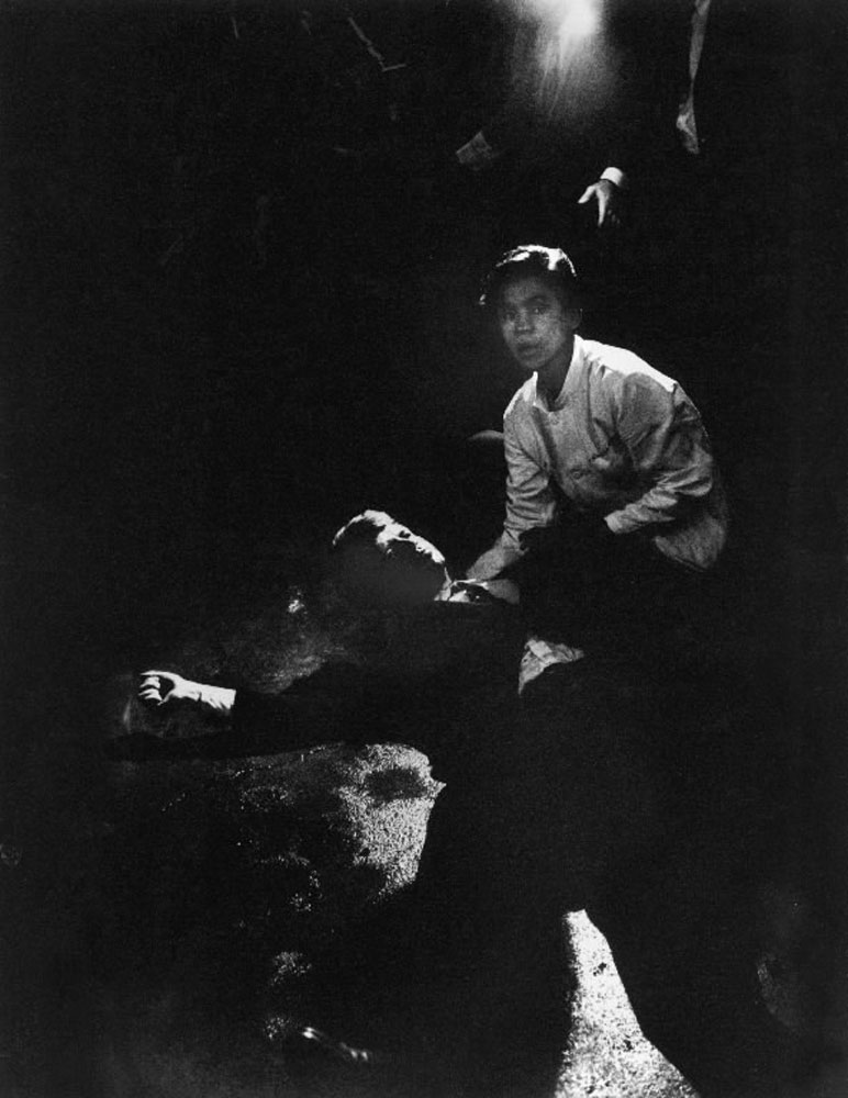 June 6, 1968. "Rigid, semiconscious, his face an ashen mask, Senator Kennedy lies in a pool of his own blood on the concrete floor, a bullet deep in his brain and another in his neck. Juan Romero, a busboy whose hand Kennedy had shaken before the shots, tried to comfort him."
