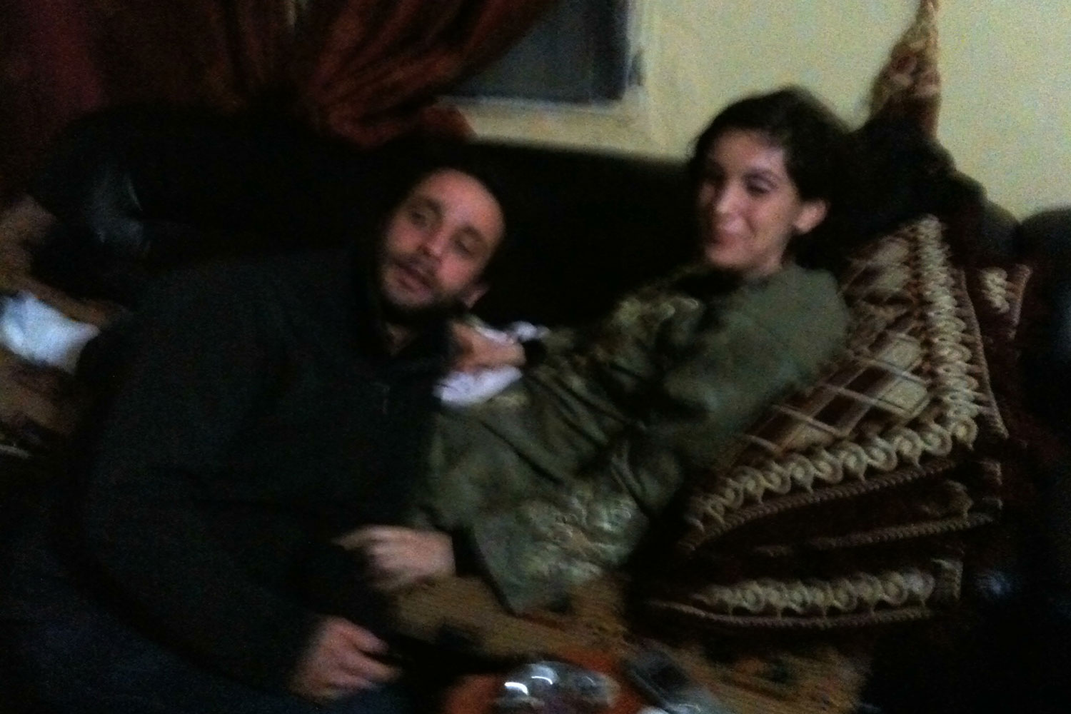 A handout image from the French news channel France 24, taken by a Syrian opposition activist late on March 1, 2012, shows French journalists William Daniels and Edith Bouvier, who sustained serious leg injuries while trapped in Syria, following their evacuation from Homs to Lebanon.
