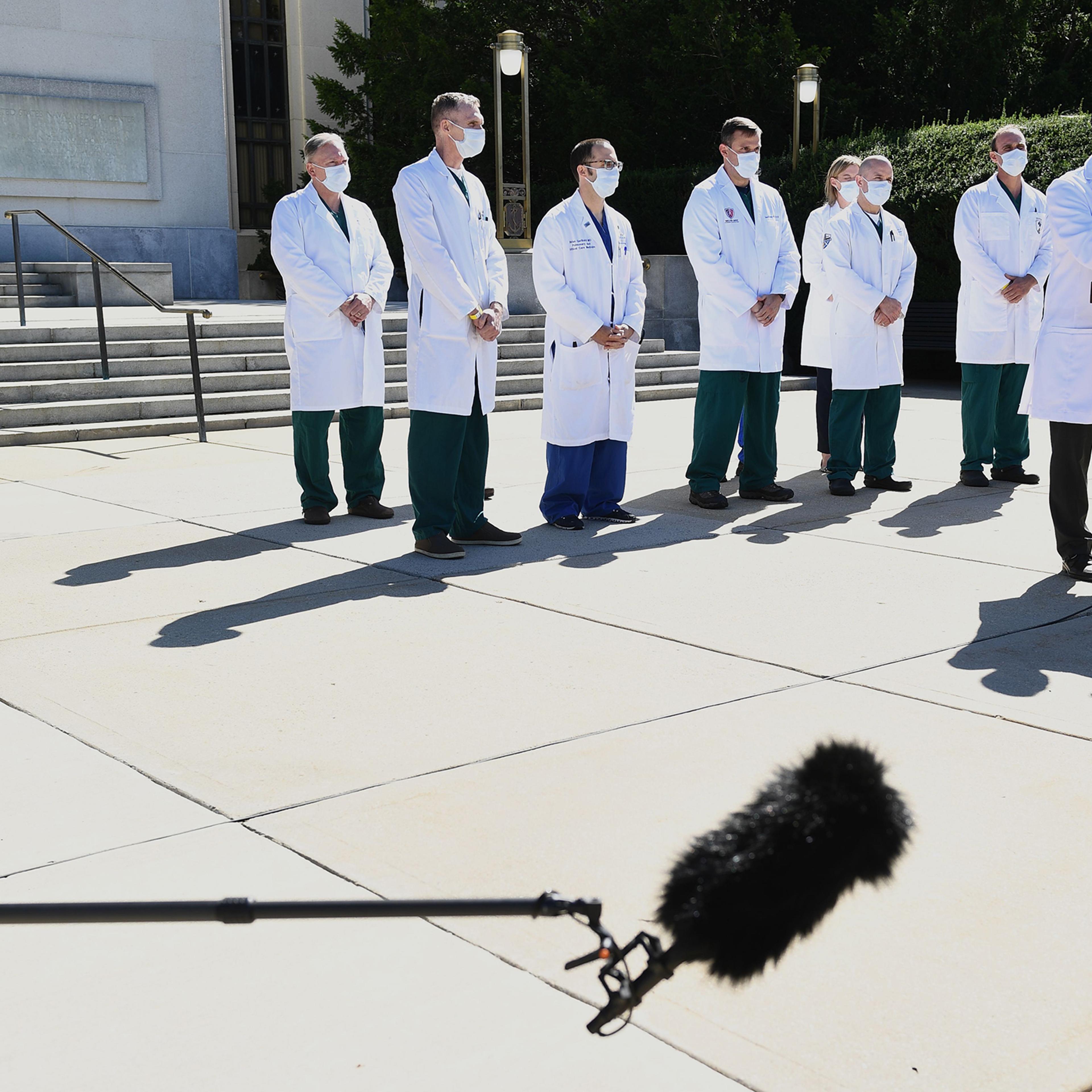 White House physician Dr. Sean Conley, right, provides an update on President Trump's condition at Walter Reed in Bethesda, Md., on Oct. 3, 2020.