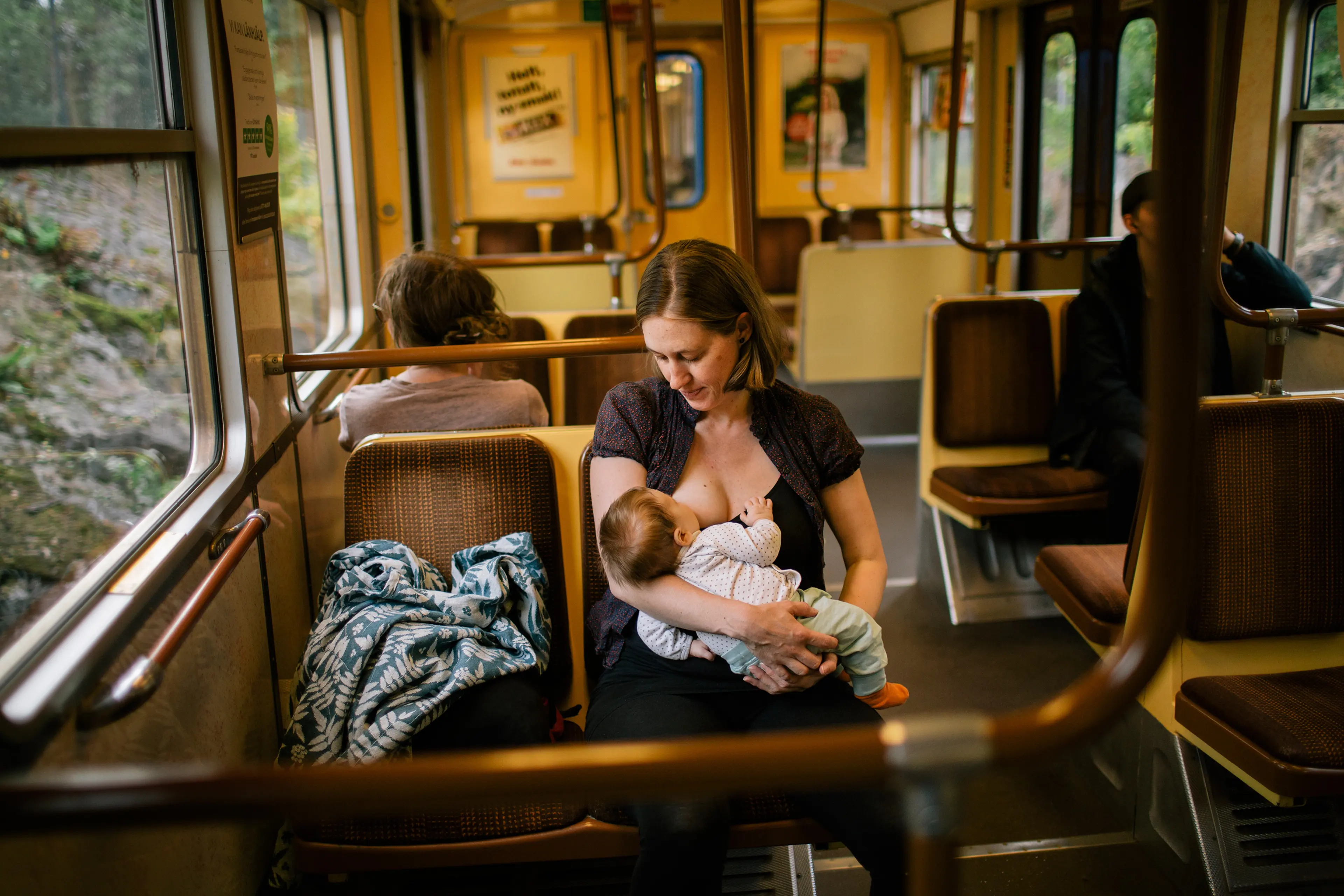 Ulrika Casselbrant, 38, breastfeeds her 8 week old child, Vera, on a commuter train in Stockholm on Aug. 19, 2018.