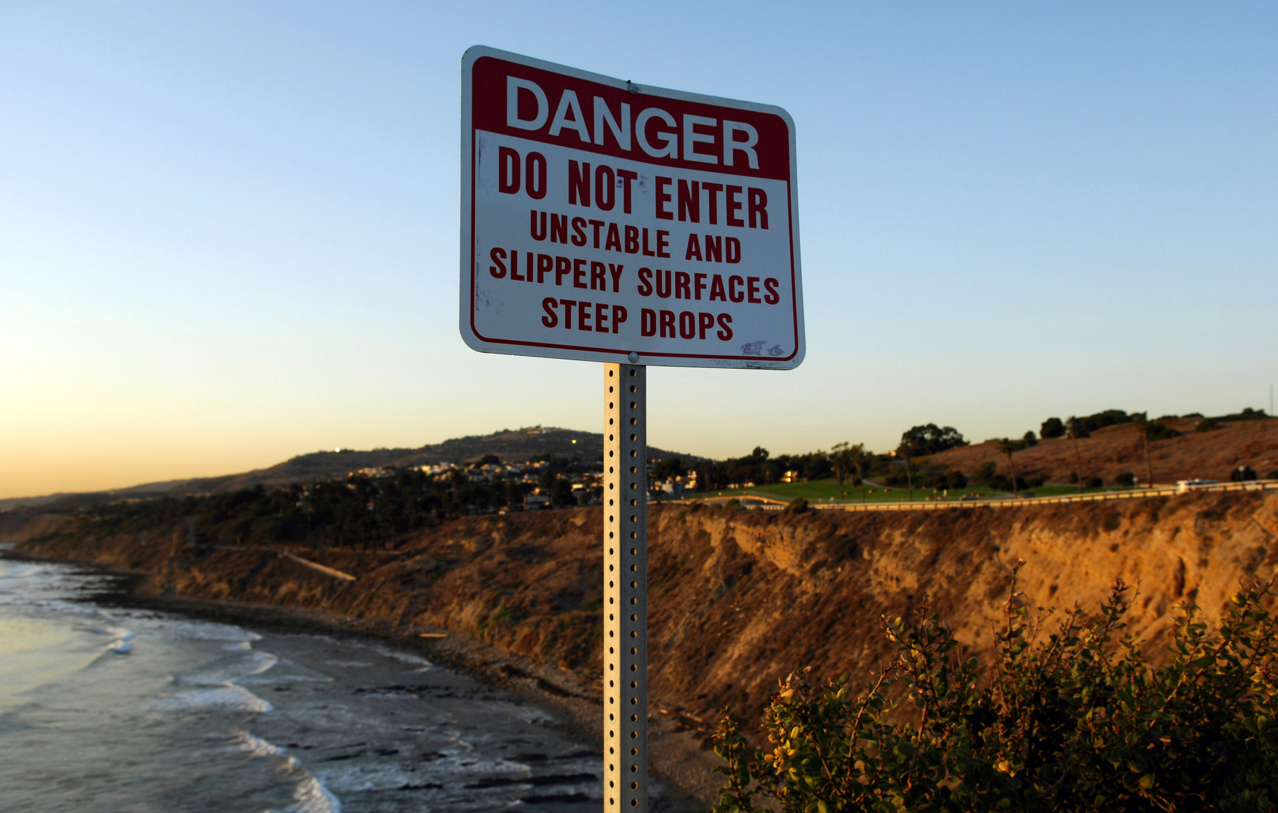 A Danger sign at Point Fermin Park in San Pedro, Calif. on Monday, January 8, 2007. The body of USC kicker Mario Danelo, 21, was found at the bottom of the rocky San Pedro cliff on Jan. 6. Los Angeles Police Department officials have ruled the death eith