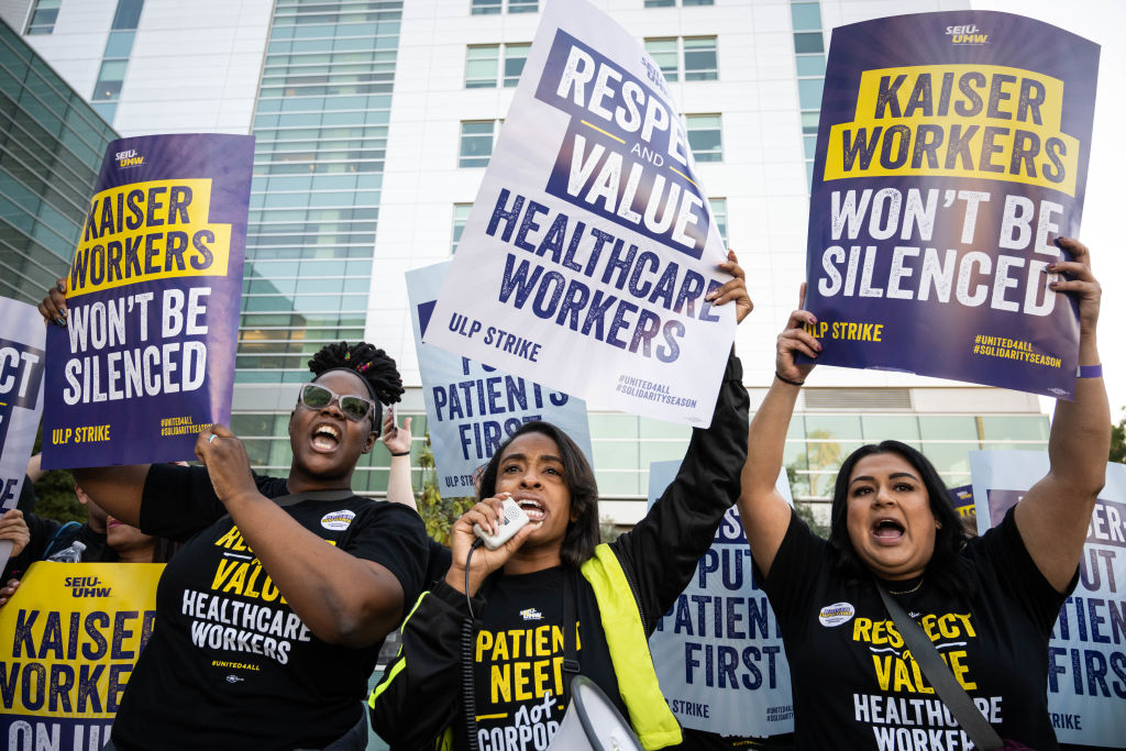 Kaiser Permanente healthcare workers walk the picket line in Los Angeles as they begin a three-day strike involving more than 75,000 Kaiser workers on Wednesday, Oct. 4, 2023.