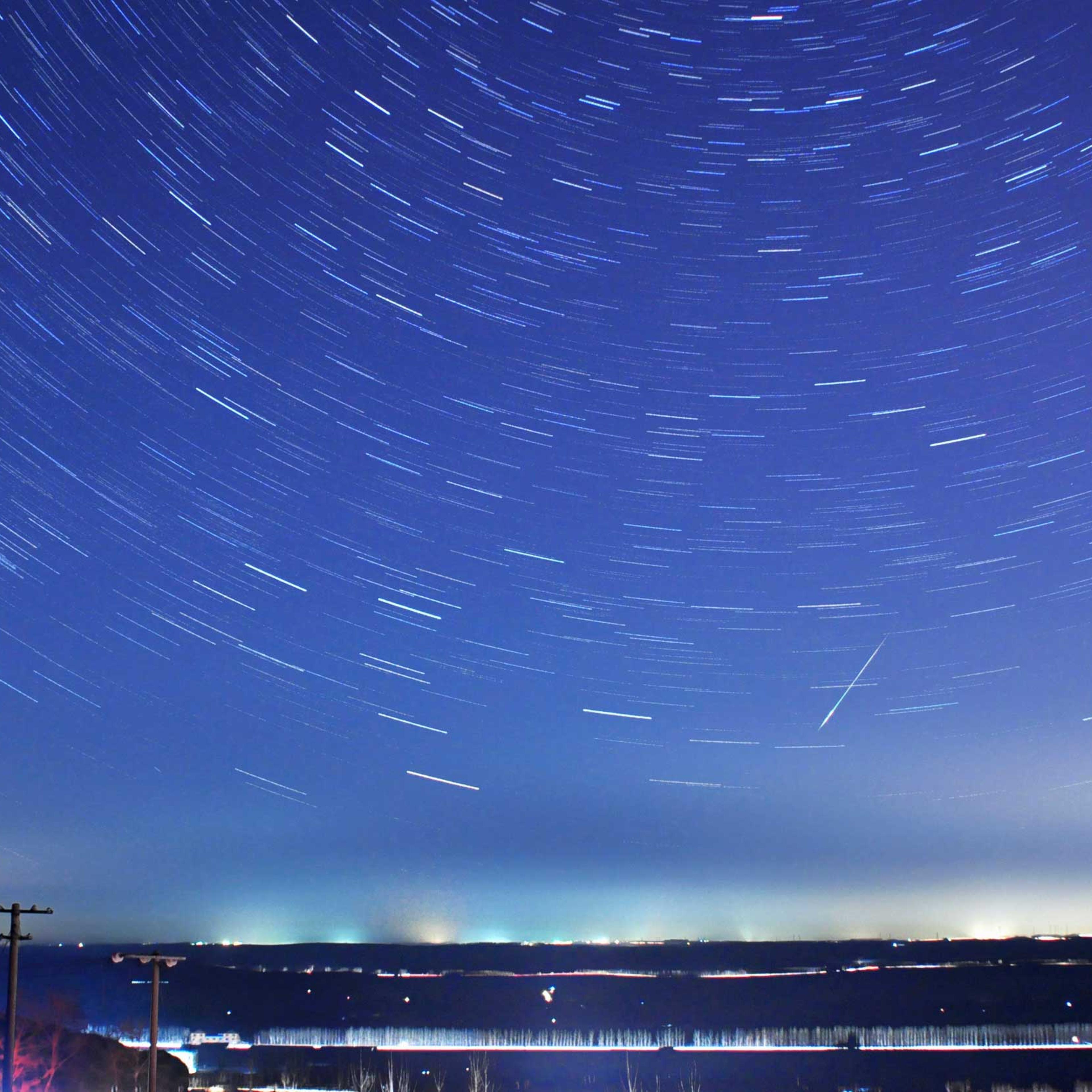 A meteor streaks past stars during the annual Quadrantid meteor shower in Qingdao