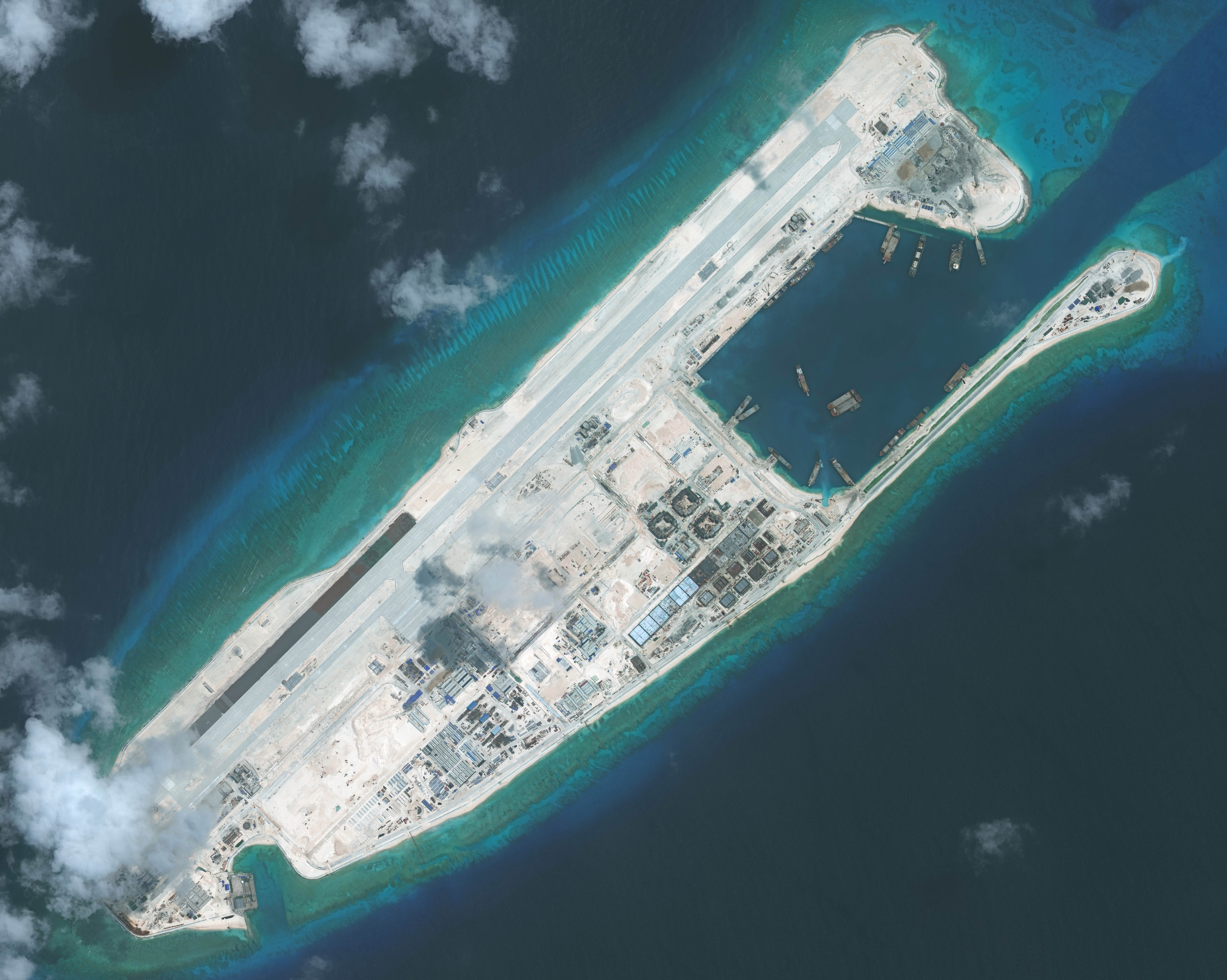 FIERY CROSS REEF, SOUTH CHINA SEA - SEPTEMBER 3, 2015:  DigitalGlobe imagery of the nearly completed construction within the Fiery Cross Reef located in the South China Sea. Fiery Cross is located in the western part of the Spratly Islands group.  Photo 