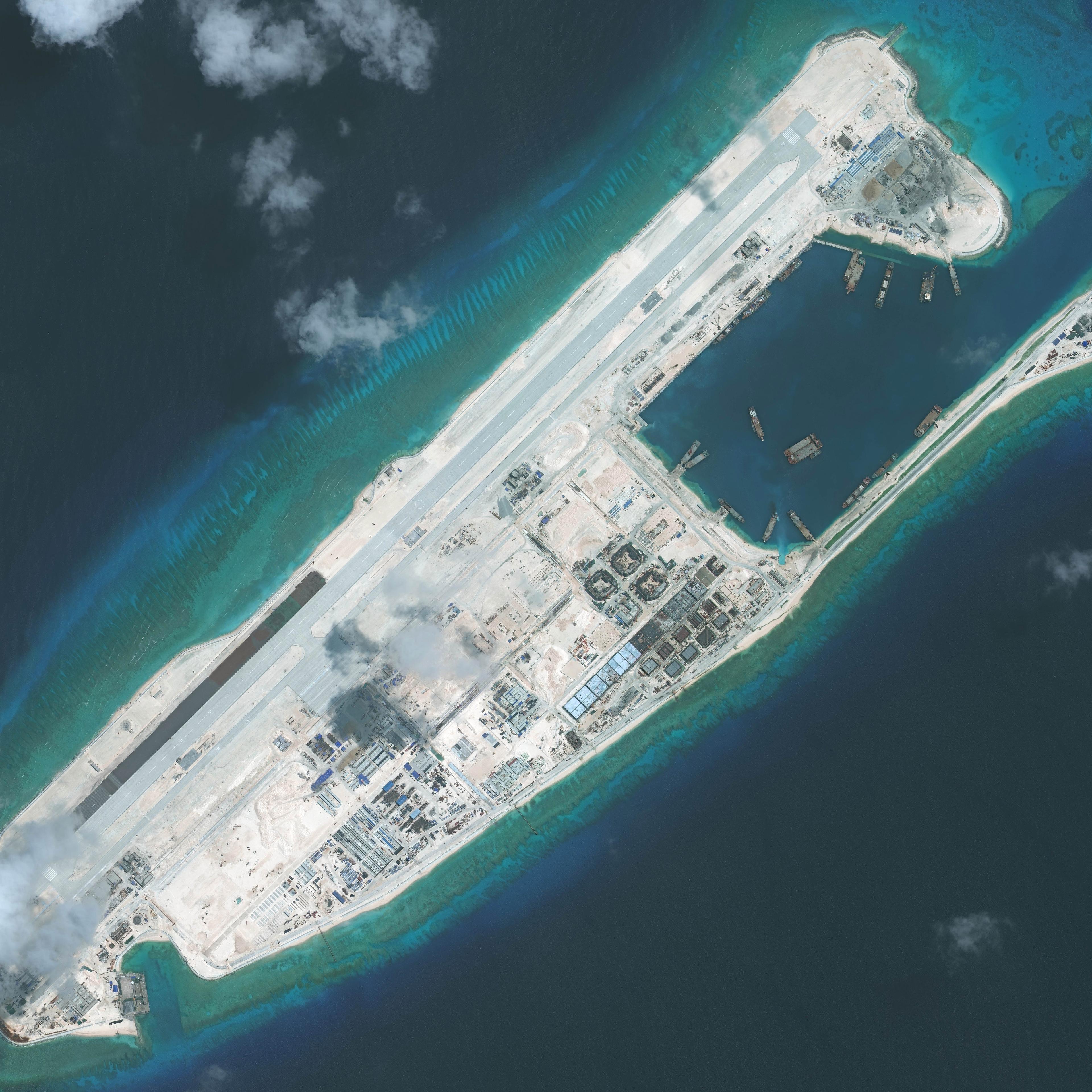 FIERY CROSS REEF, SOUTH CHINA SEA - SEPTEMBER 3, 2015: DigitalGlobe imagery of the nearly completed construction within the Fiery Cross Reef located in the South China Sea. Fiery Cross is located in the western part of the Spratly Islands group. Photo