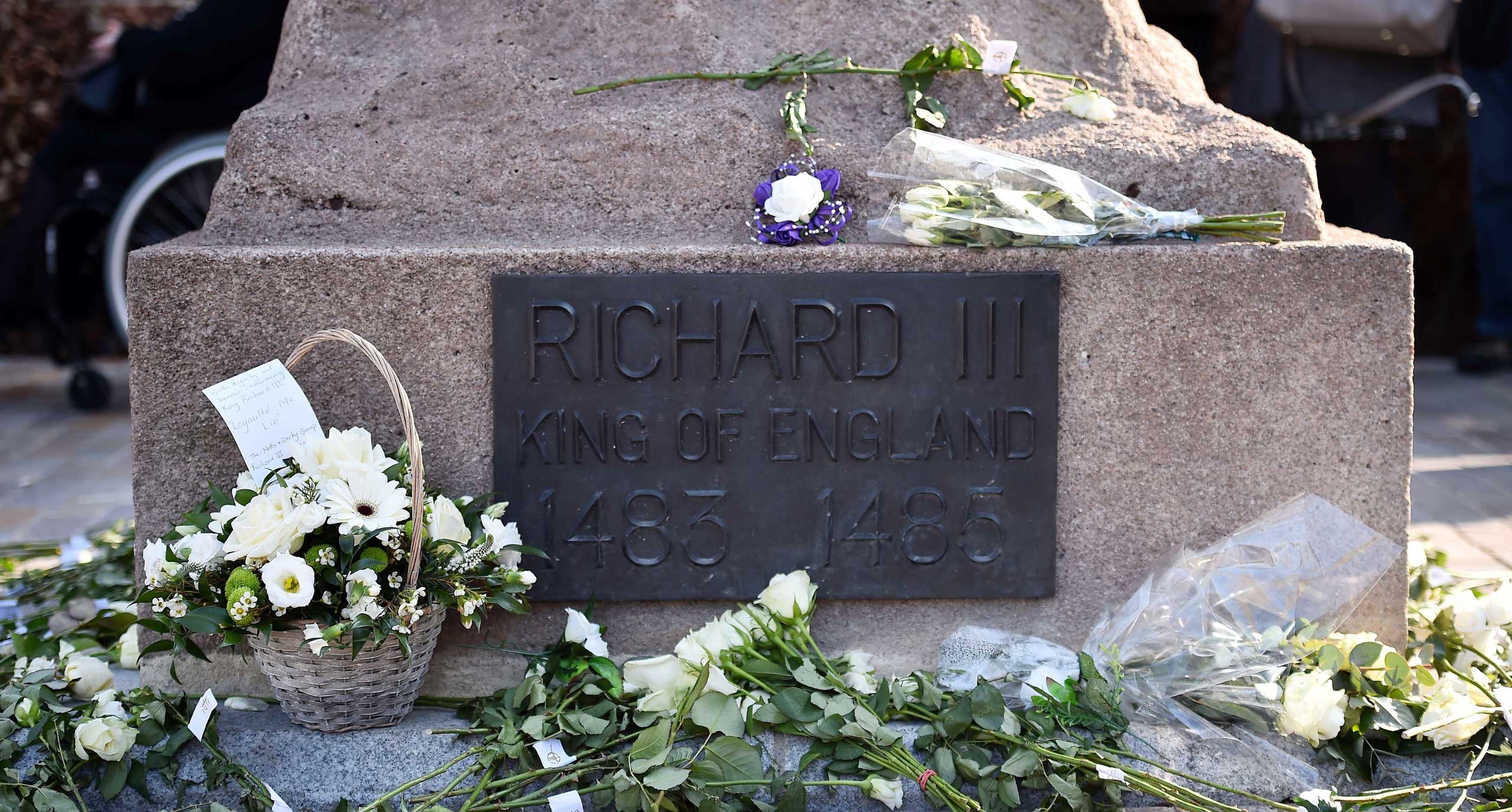 Floral tributes are pictured as members of the public queue to view the coffin containing the remains of England's King Richard III in Leicester Cathedral in Leicestershire, England on March 23, 2015.