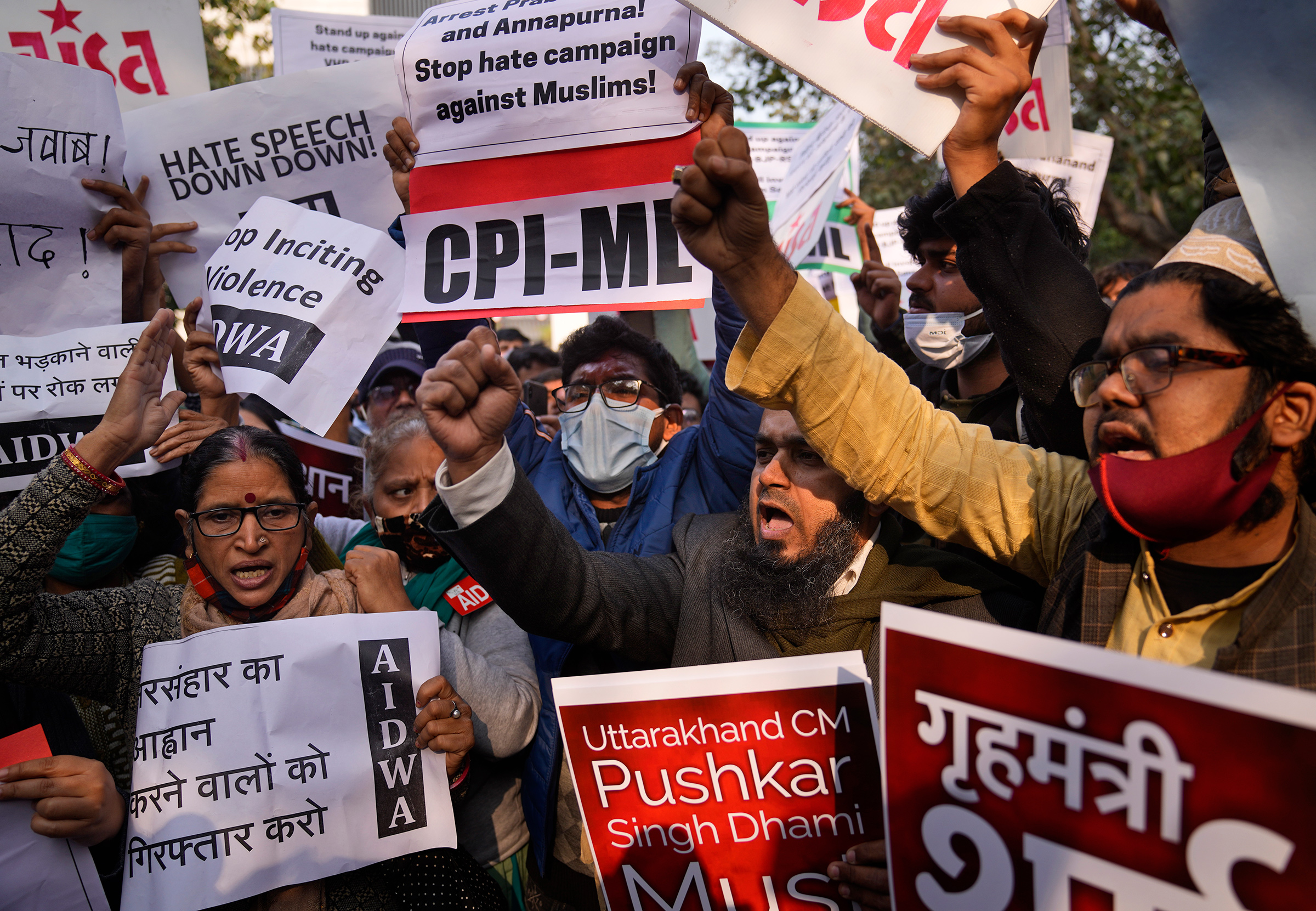 Demonstrators shout slogans during a protest against hate speech in New Delhi on Dec. 27, in reaction to a recent event at Haridwar, northern Uttarakhand where some leaders made communally sensitive speeches at a religious gathering