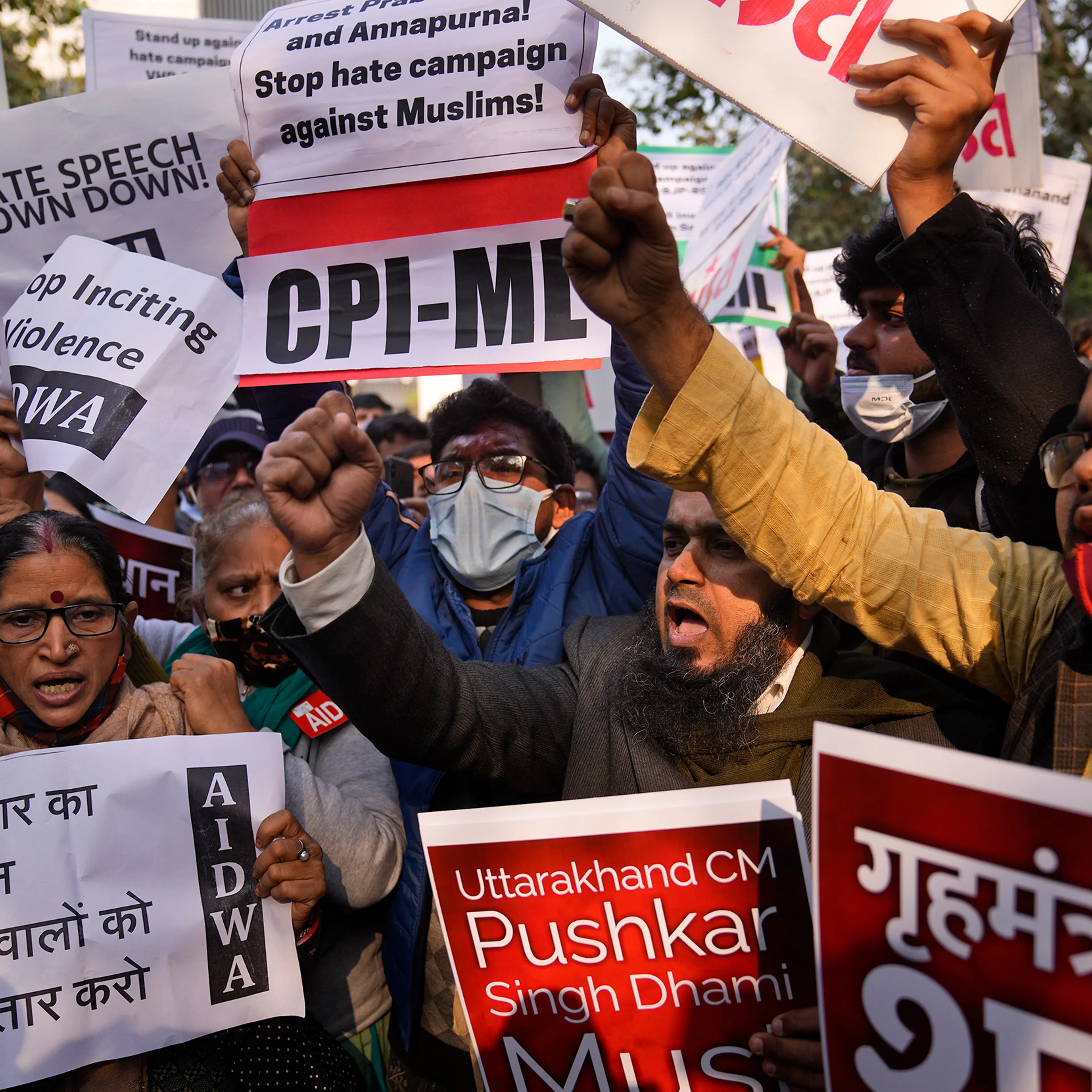 Demonstrators shout slogans during a protest against hate speech in New Delhi on Dec. 27, in reaction to a recent event at Haridwar, northern Uttarakhand where some leaders made communally sensitive speeches at a religious gathering