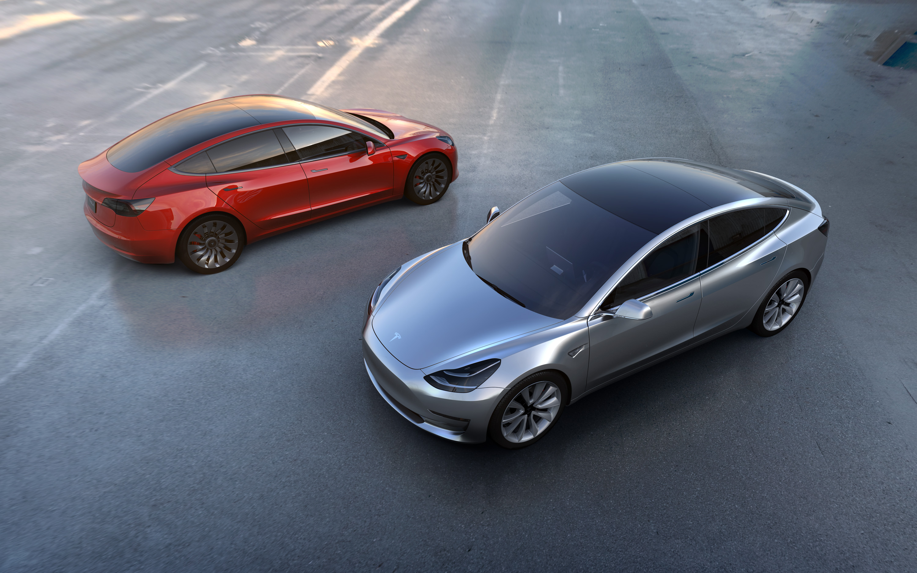This undated photo provided by Tesla Motors shows the new Model 3 car. At a starting price of $35,000  before federal and state government incentives  the Model 3 is less than half the cost of Tesla's previous models.