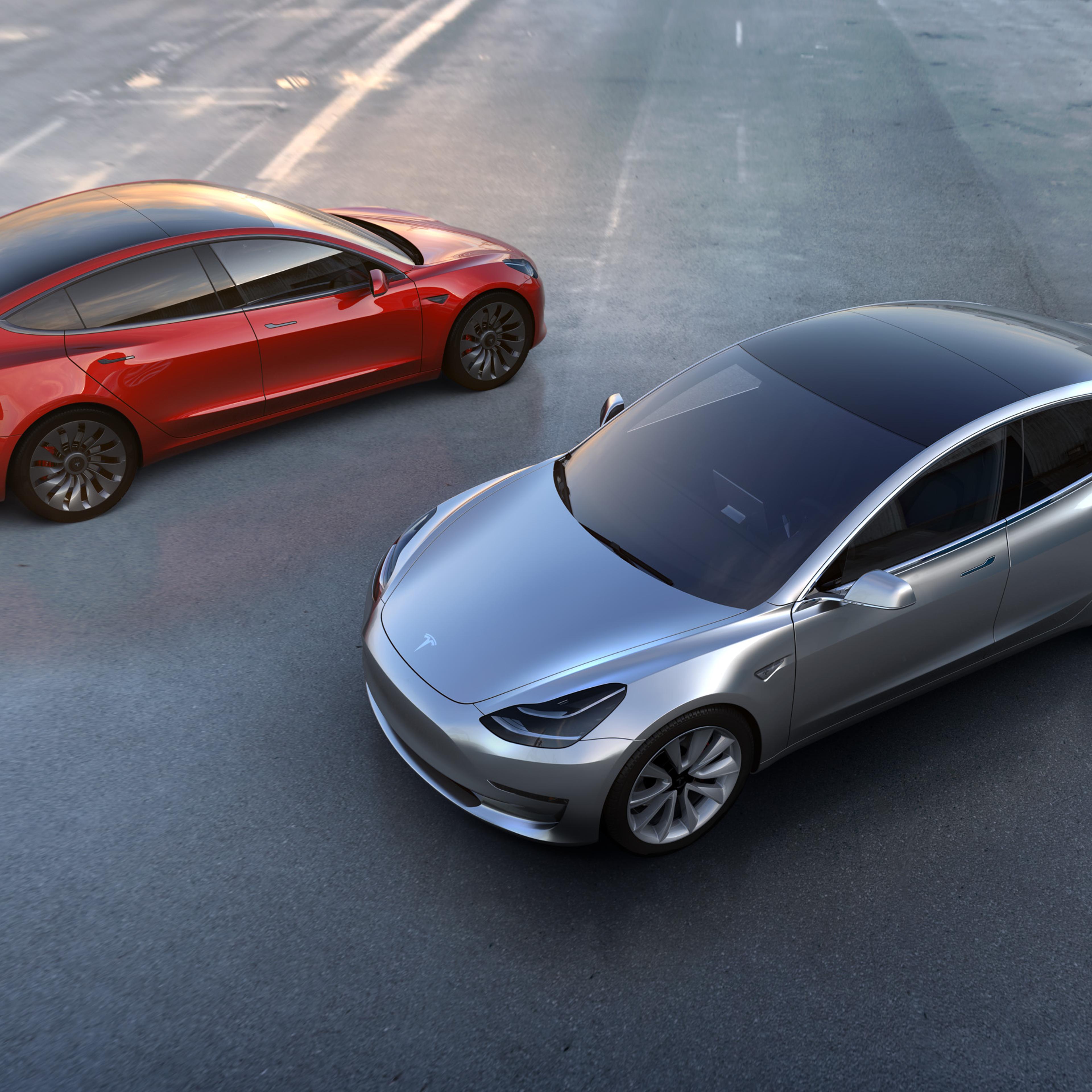 This undated photo provided by Tesla Motors shows the new Model 3 car. At a starting price of $35,000 before federal and state government incentives the Model 3 is less than half the cost of Tesla's previous models.