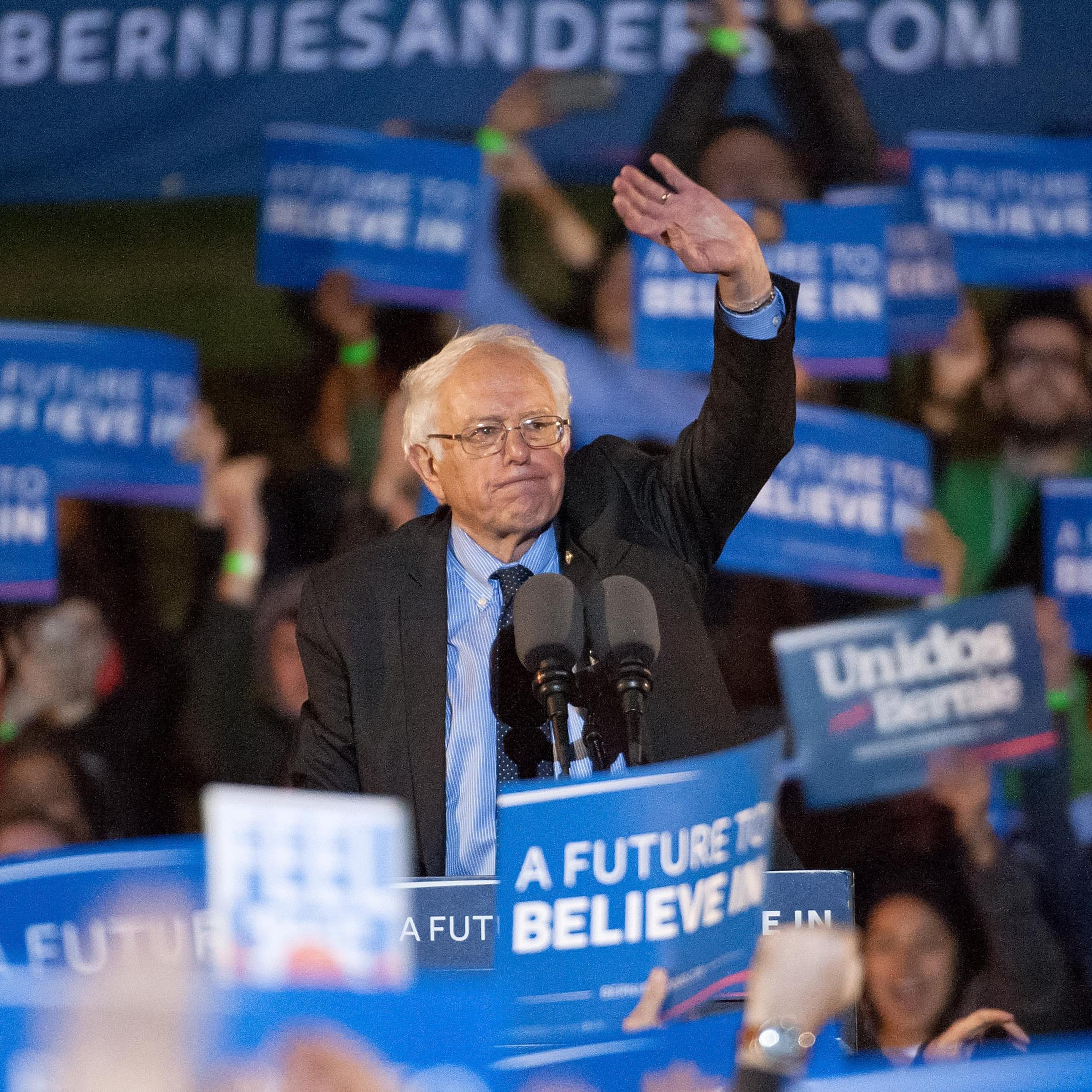 2016 Democratic presidential candidate U.S. Senator Bernie Sanders (D-VT) waves to supporters at a campaign event at Saint Mary's Park on March 31, 2016 in New York City.