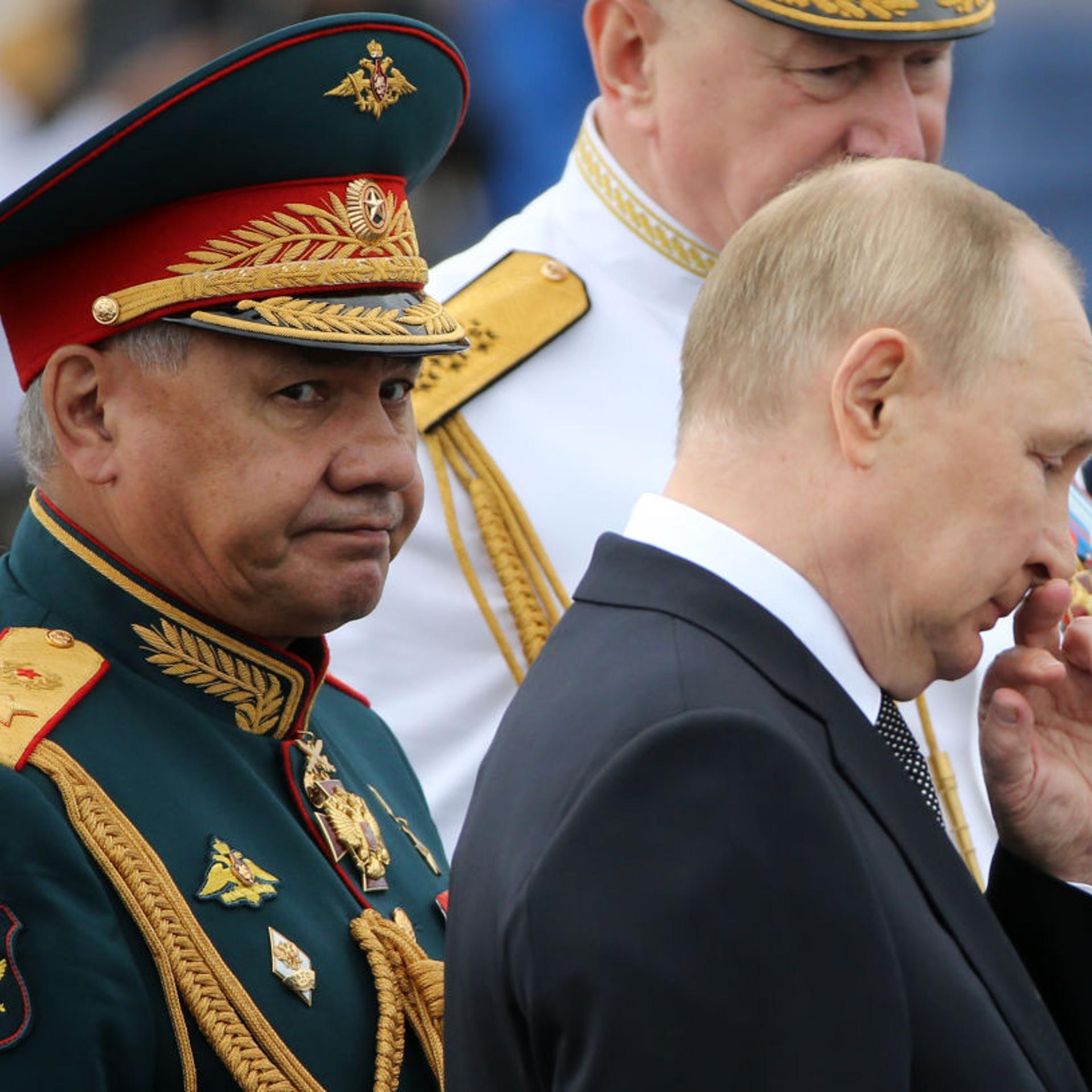 Russian President Vladimir Putin (R) and Defense Minister Sergei Shoigu (L) seen during the Navy Day Parade.