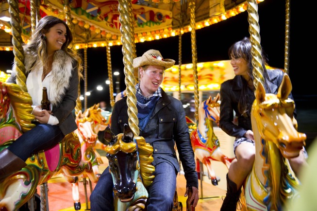 I WANNA MARRY "HARRY":  Matthew Hicks (aka "Harry," C), Meghan (L) and Jacqueline (R) enjoy a carnival on the grounds of the estate in the "A Pageant for the 'Prince'" episode of I WANNA MARRY "HARRY" airing Tuesda