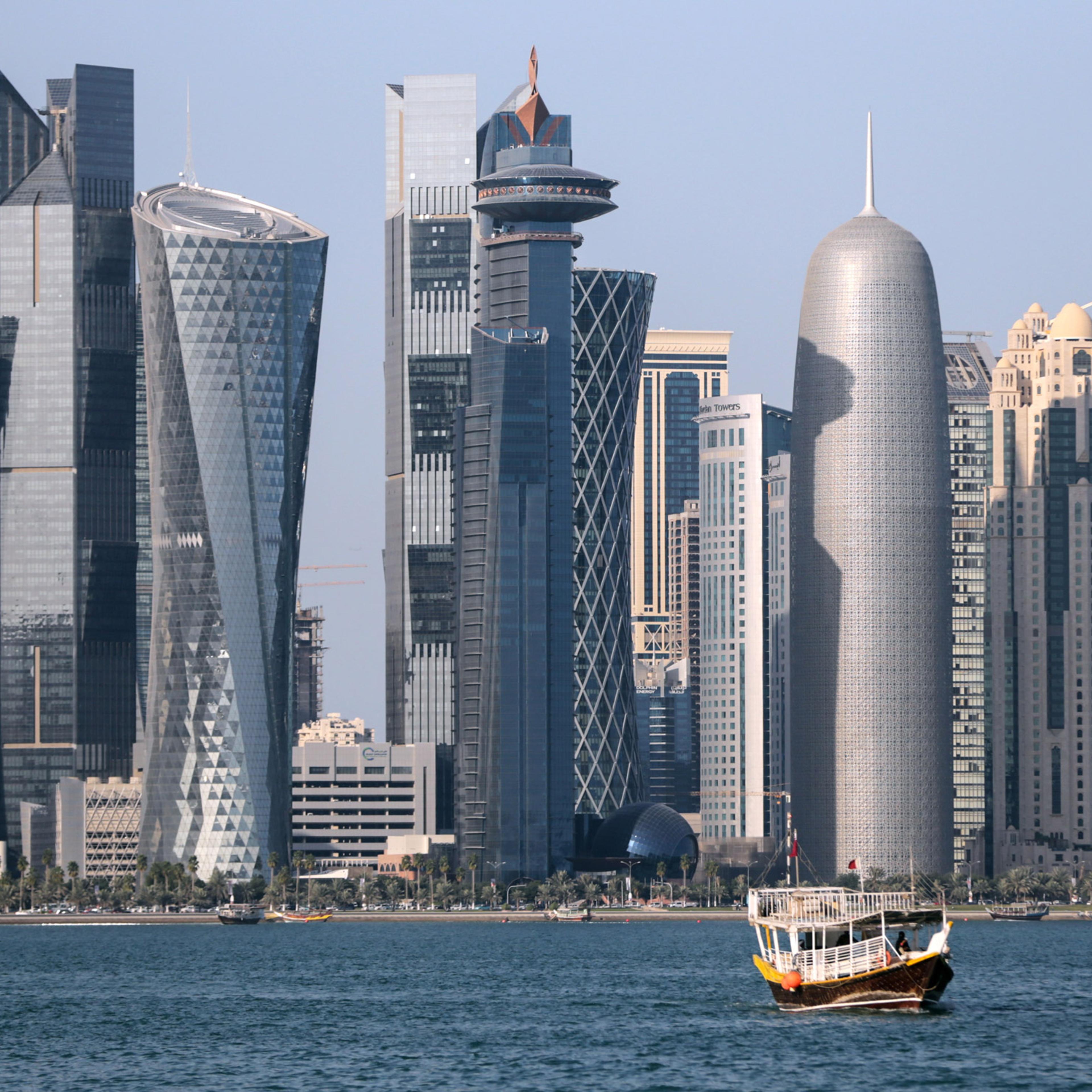 A wooden boat cruises in front of the skyline of the city of Doha, Qatar, 15 January 2015. The men's Handball World Championship takes place in Qatar from 15 January to 01 February. Photo by: Axel Heimken/picture-alliance/dpa/AP Images
