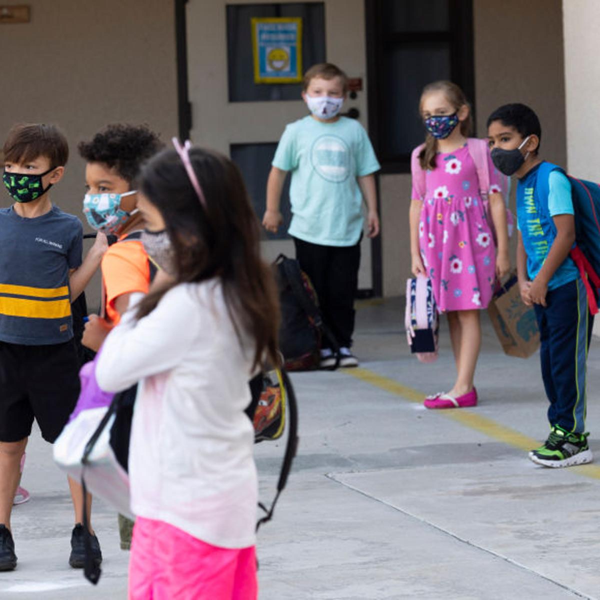 Students keep their distance and wear masks during the first day of in-person classes at an elementary school in Rancho Santa Margarita, Calif. on Sept. 29, 2020.