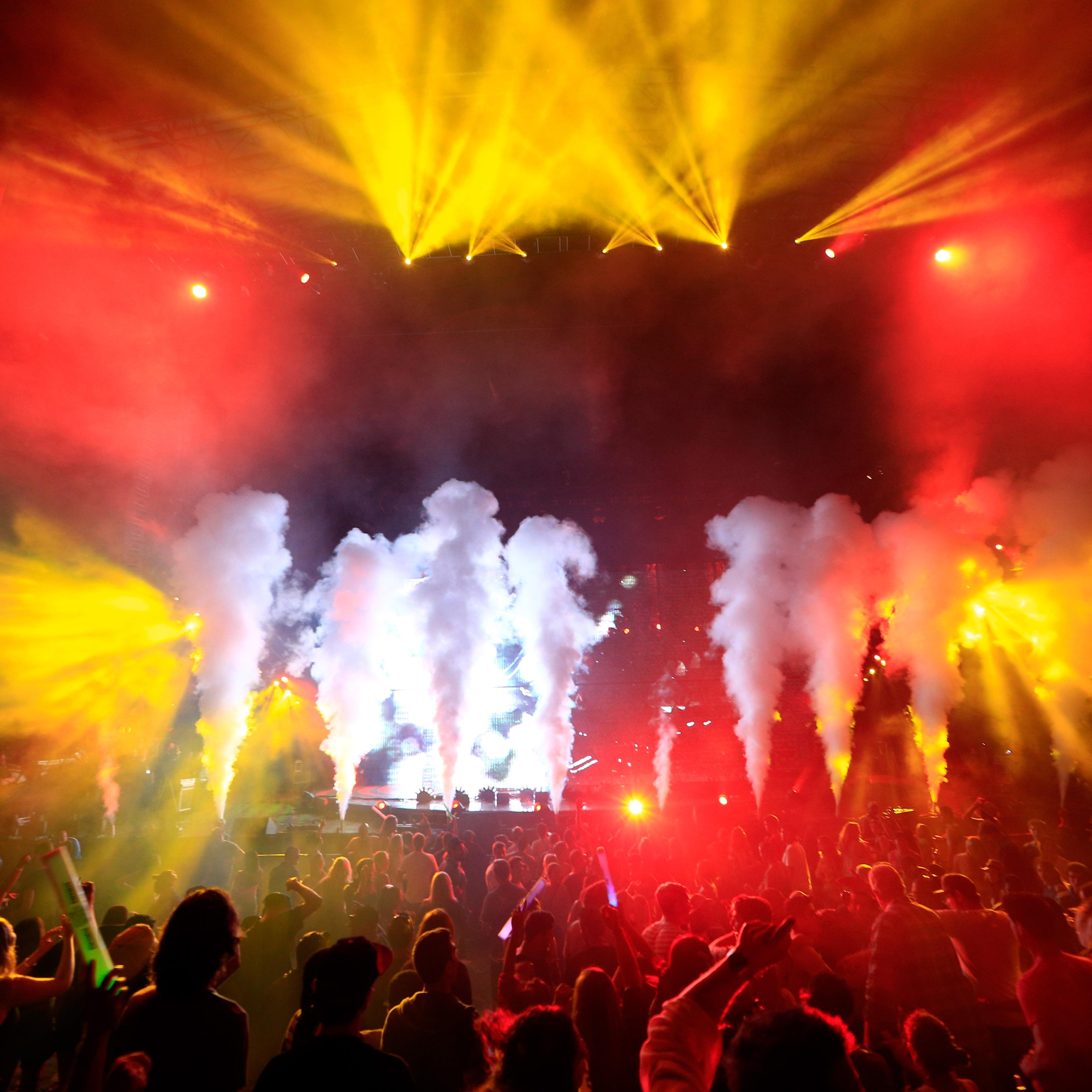 Avicii performs onstage during the 22nd Annual KROQ Weenie Roast at Verizon Wireless Music Center on May 31, 2014 in Irvine, California.
