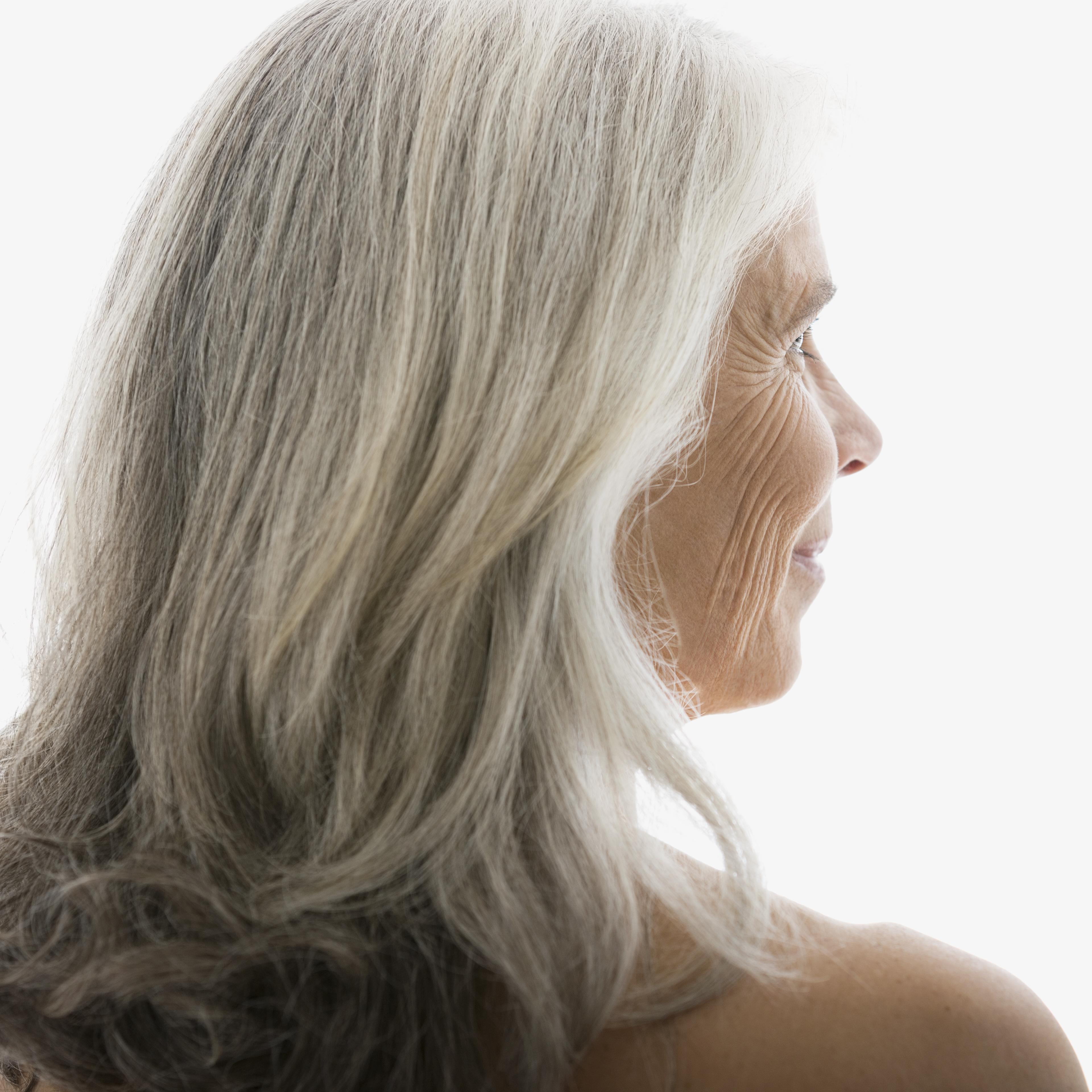 Rear view of senior woman with gray hair