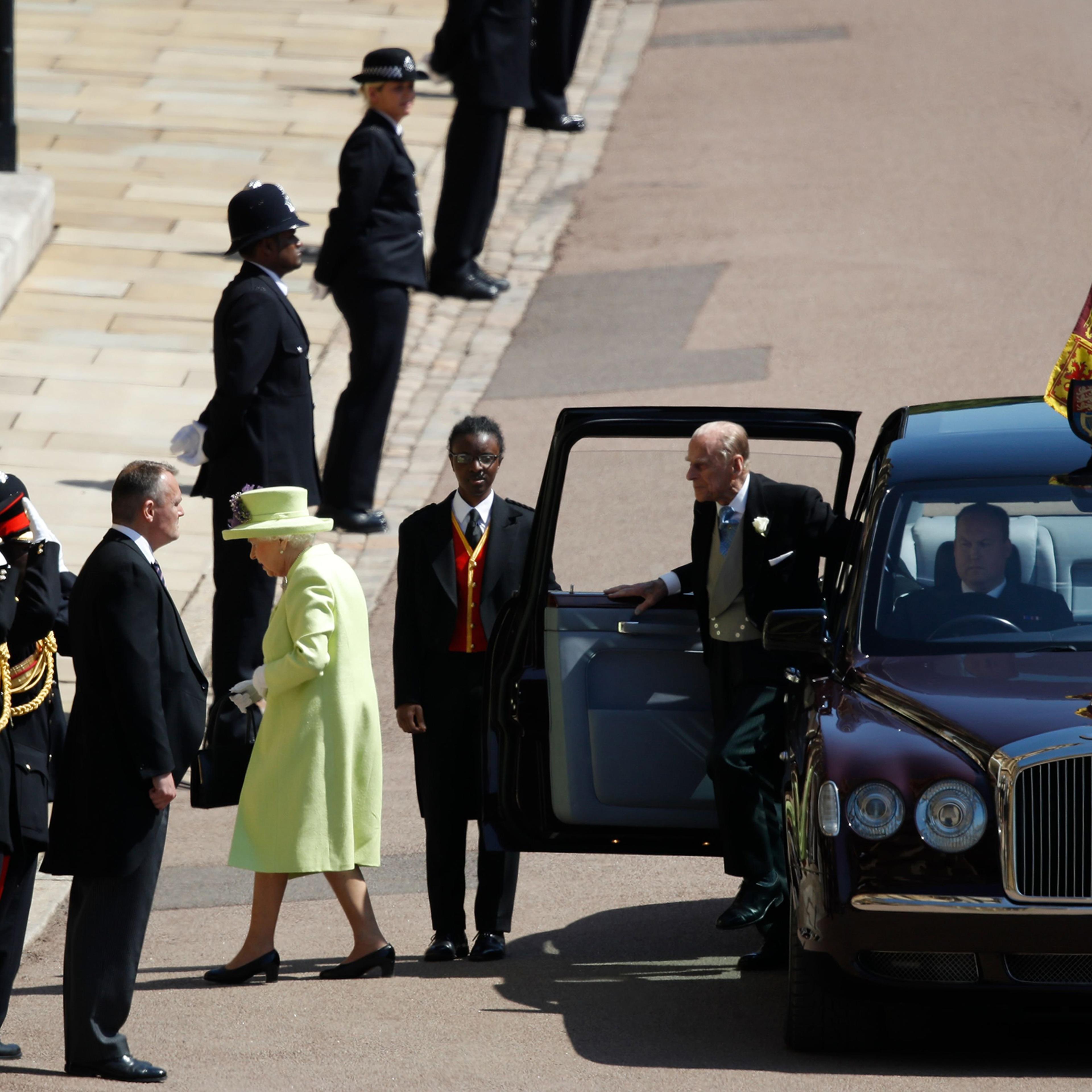 Queen Elizabeth II and Prince Philip, Duke of Edinburgh arrive at St George's Chapel, Windsor Castle, in Windsor, on May 19, 2018.