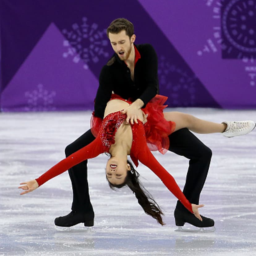 Korea's Yura Min and Alexander Gamelin compete in the figure skating team event at the PyeongChang 2018 Winter Olympics