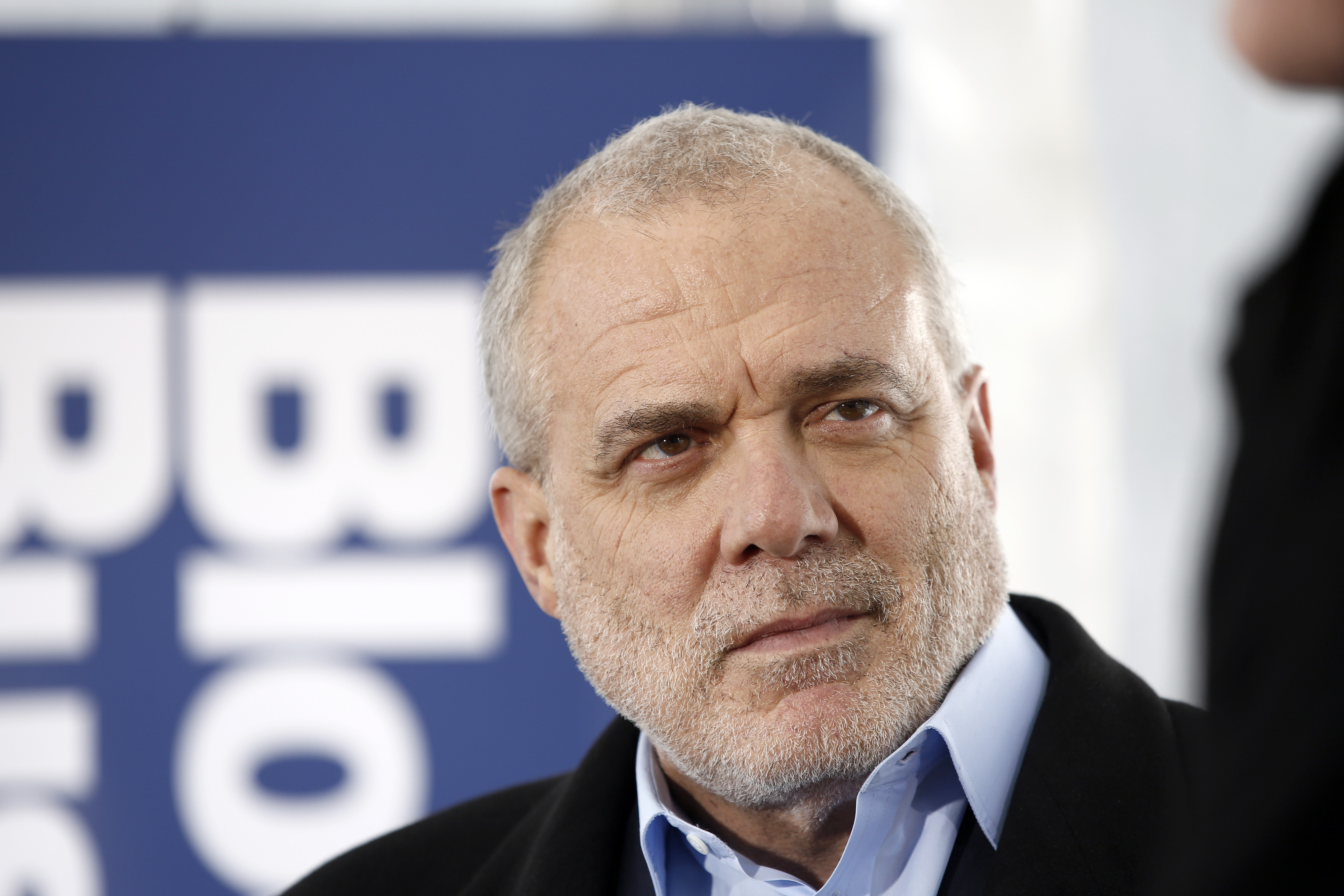 Mark Bertolini, chief executive officer of Aetna Inc., pauses during a Bloomberg Television interview on day three of the World Economic Forum (WEF) in Davos, Switzerland, on Friday, Jan. 23, 2015.