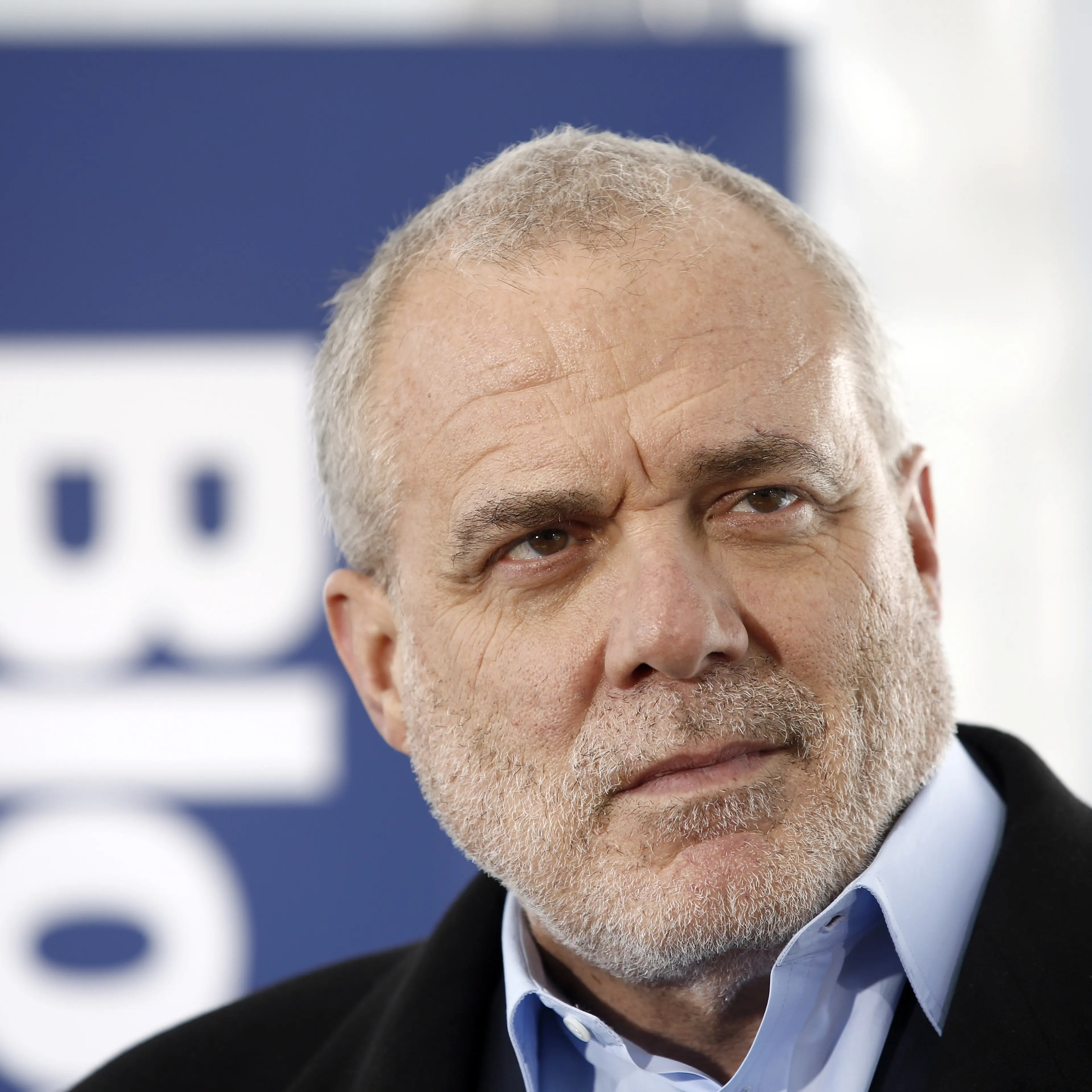 Mark Bertolini, chief executive officer of Aetna Inc., pauses during a Bloomberg Television interview on day three of the World Economic Forum (WEF) in Davos, Switzerland, on Friday, Jan. 23, 2015.