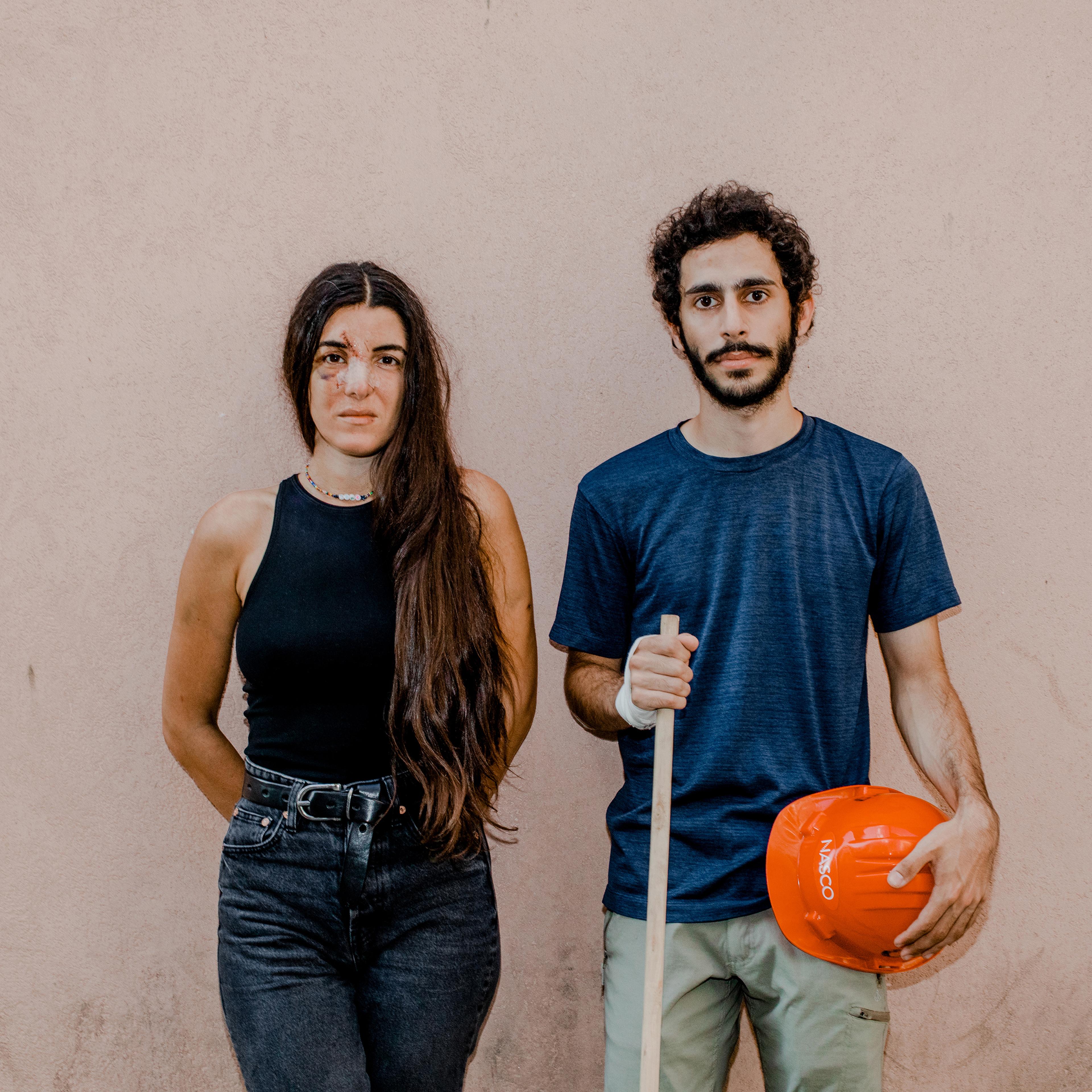 Angelique Sabounjian and Cherif Kanaan on Aug. 10. Six days earlier, she was hit in the face with a piece of glass as the blast wave tore through the coffee shop where she was working in Beirut's Gemmayze neighborhood. Sabounjian walked to the "completel