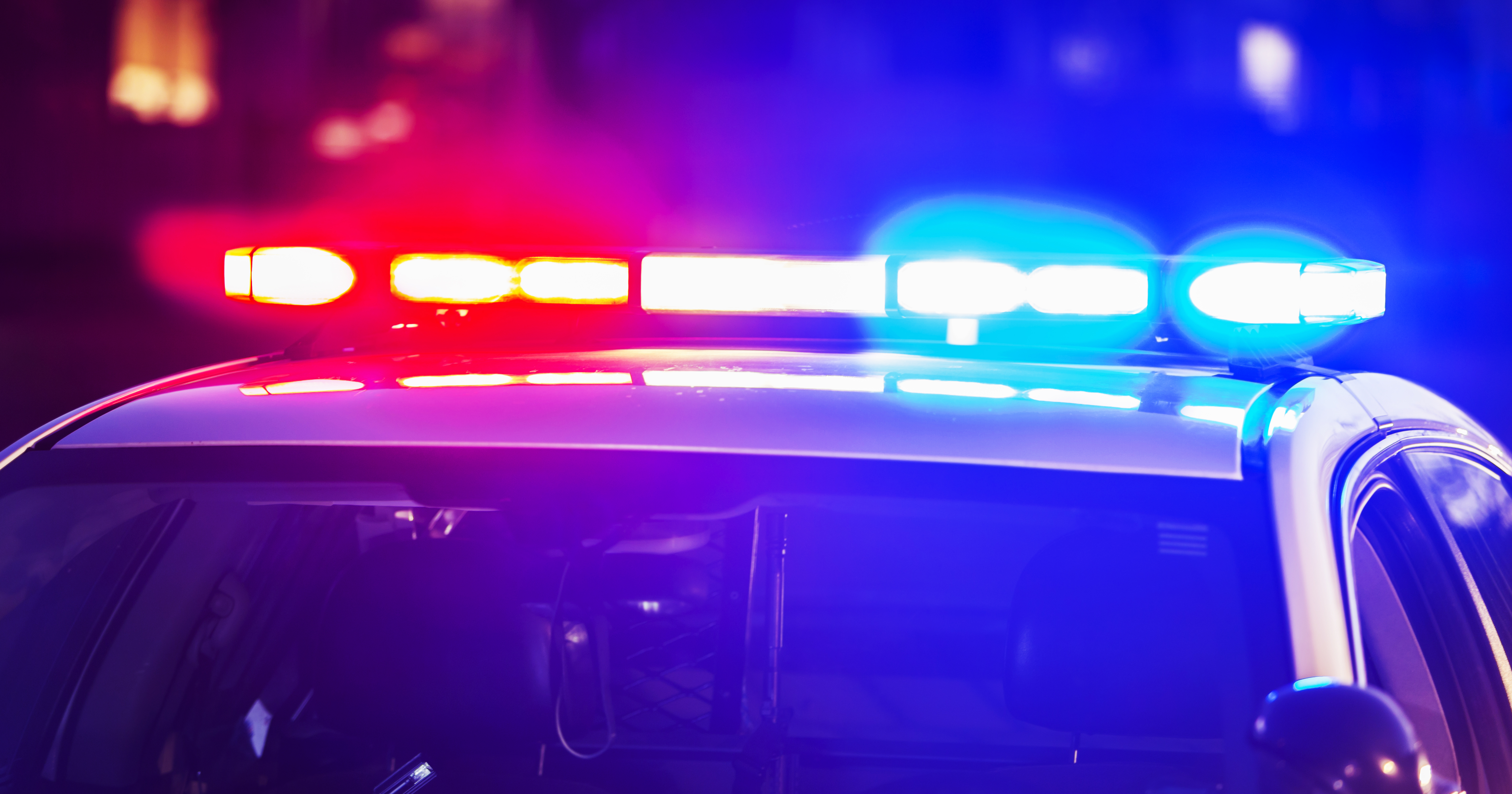 Flashing lights on top of police patrol car