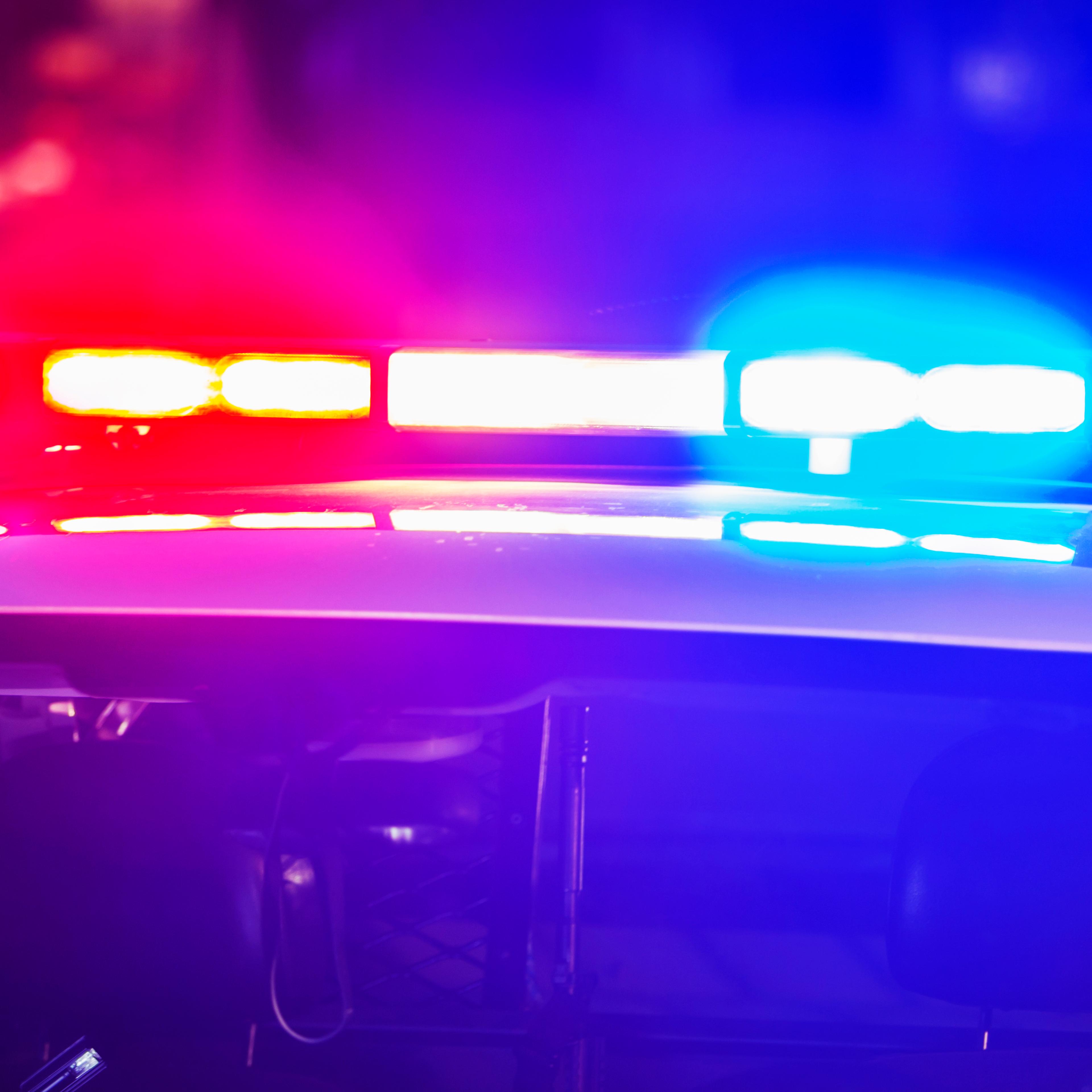 Flashing lights on top of police patrol car
