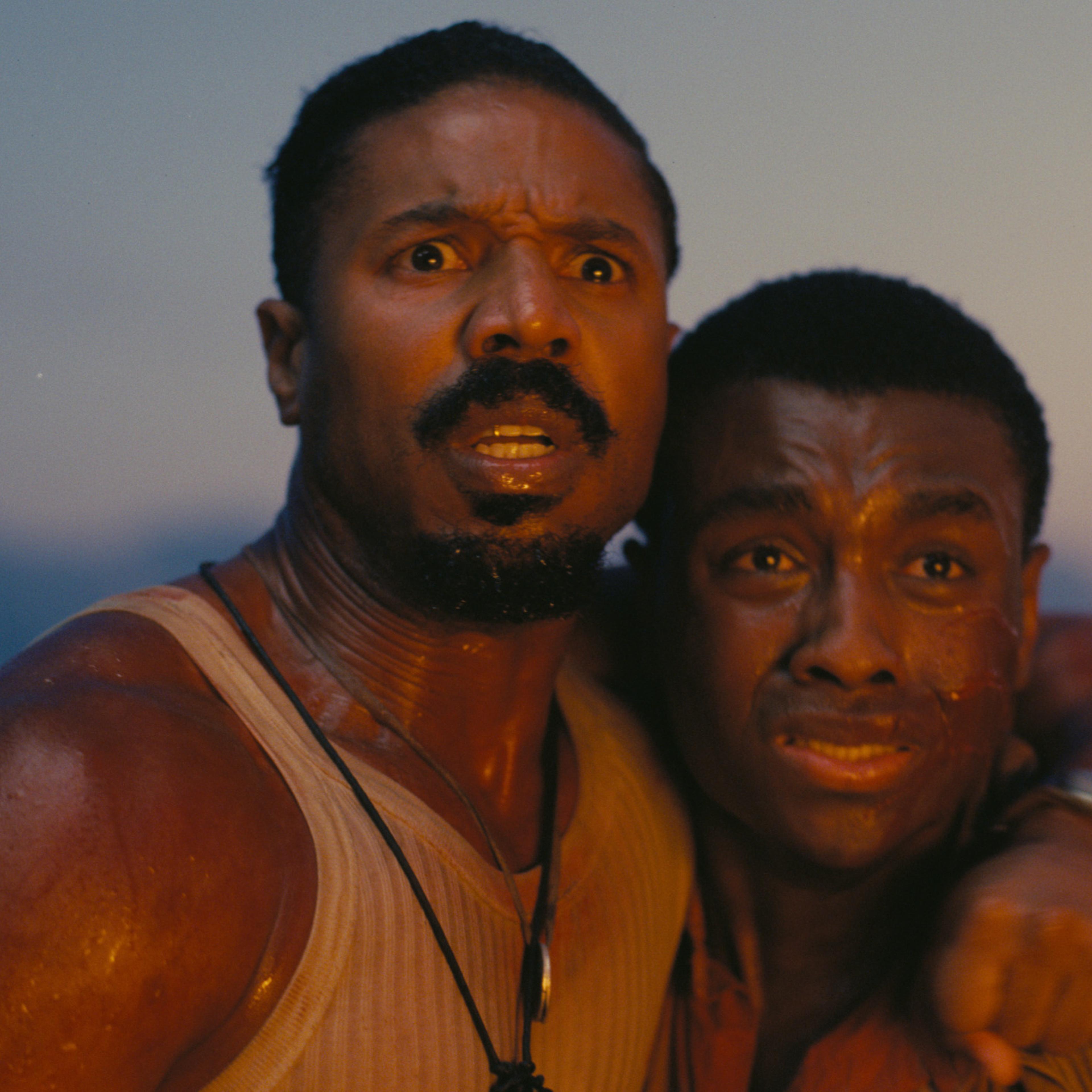 Michael B. Jordan as Smoke and Miles Caton as Sammie in 'Sinners.'