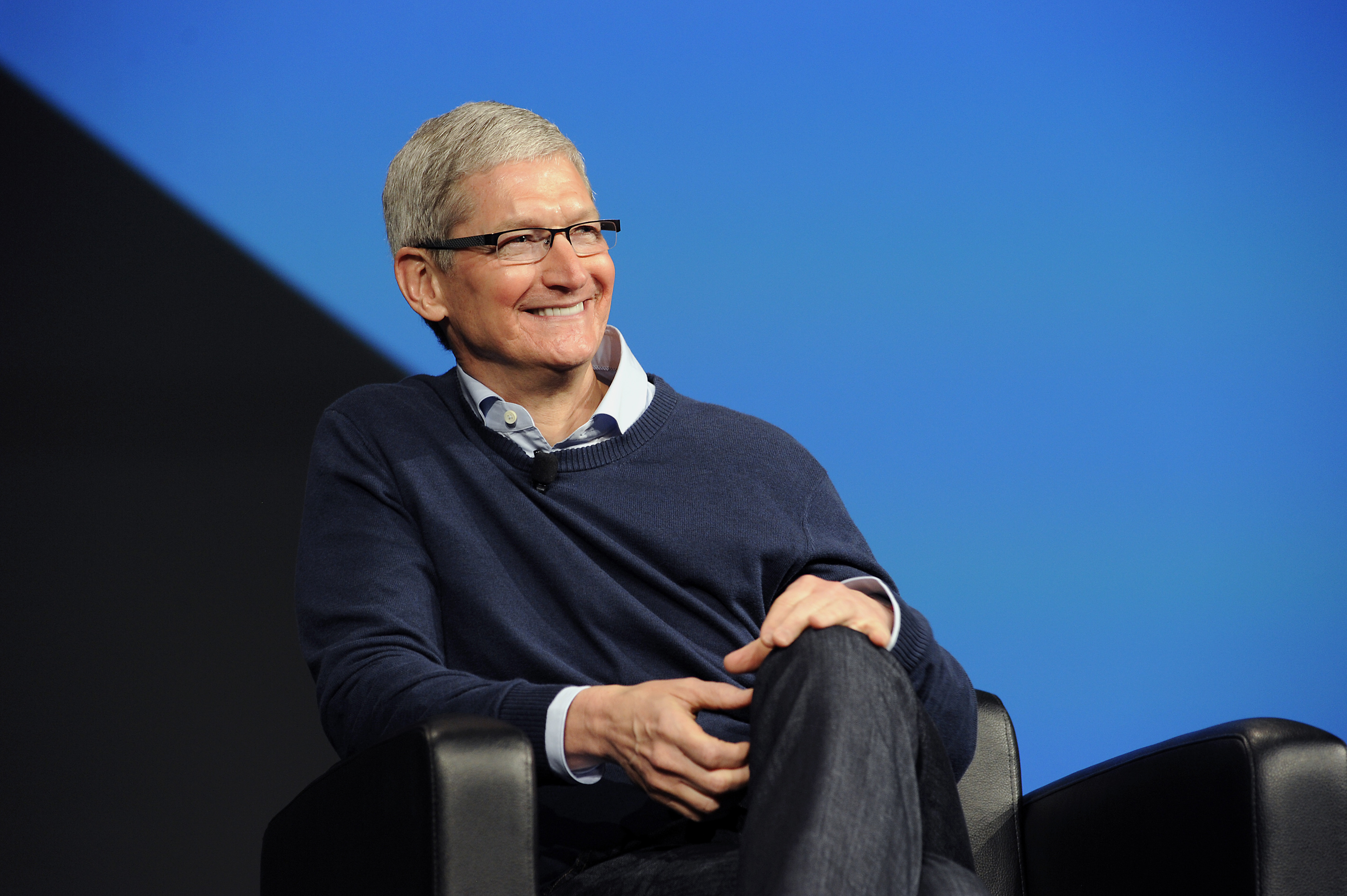 Tim Cook, CEO of Apple, sits on stage during Boxworks 2015 at the Moscone Center in San Francisco, California, U.S., on Tuesday, September 29, 2015. Photographer: Michael Short/Bloomberg