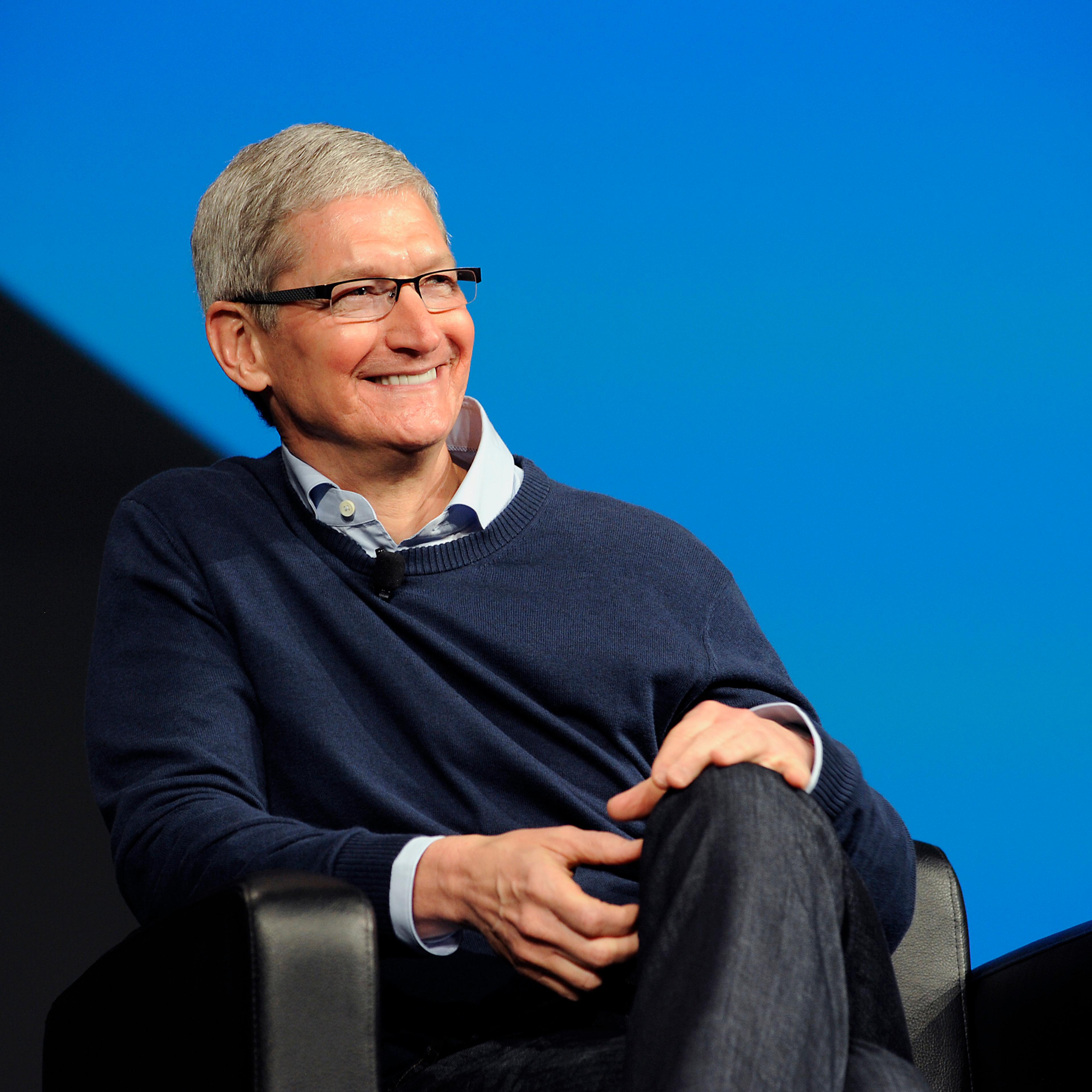 Tim Cook, CEO of Apple, sits on stage during Boxworks 2015 at the Moscone Center in San Francisco, California, U.S., on Tuesday, September 29, 2015. Photographer: Michael Short/Bloomberg