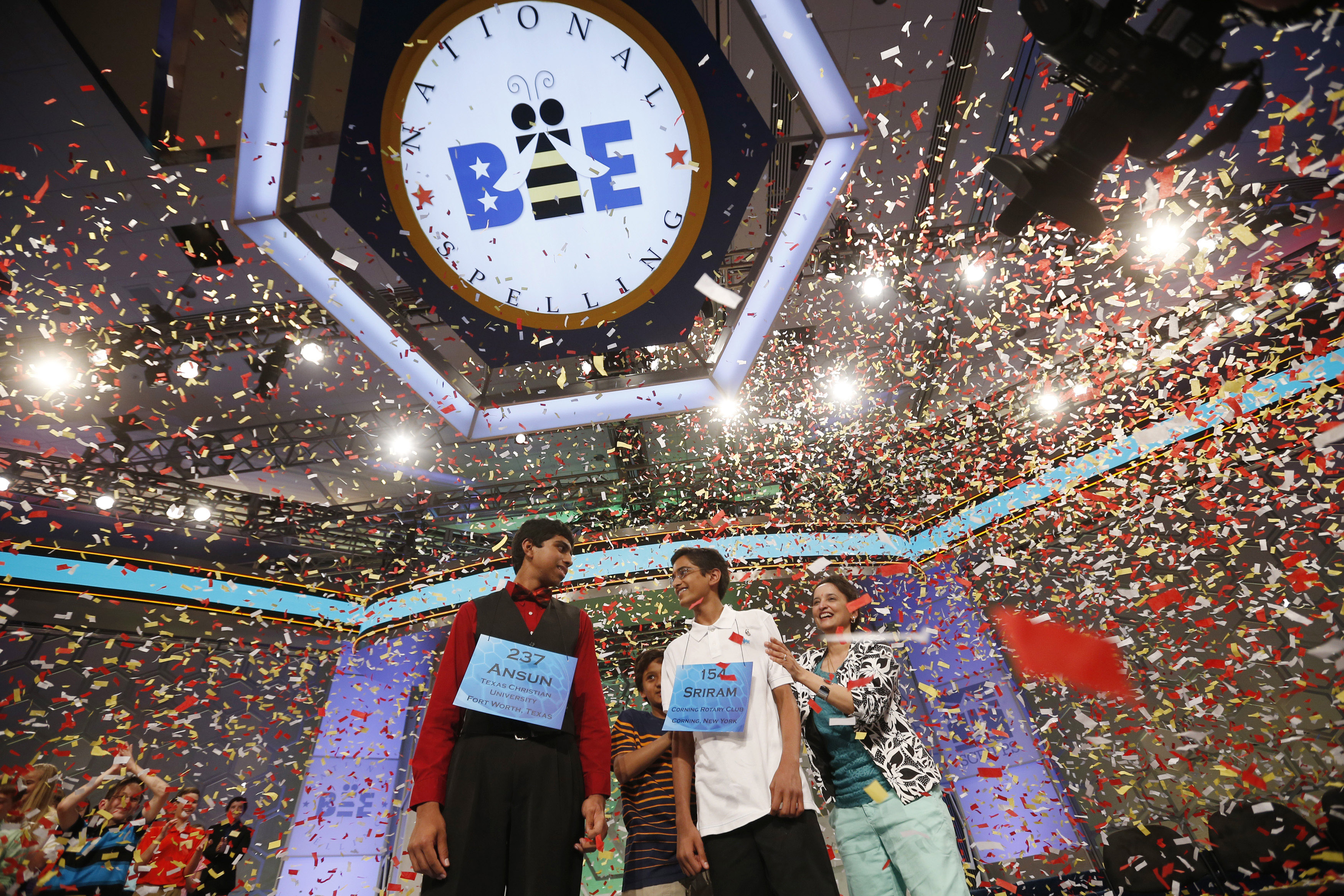 Hathwar stands next to his mother as he and Sujoe are joint winners of the 87th annual Scripps National Spelling Bee at National Harbor