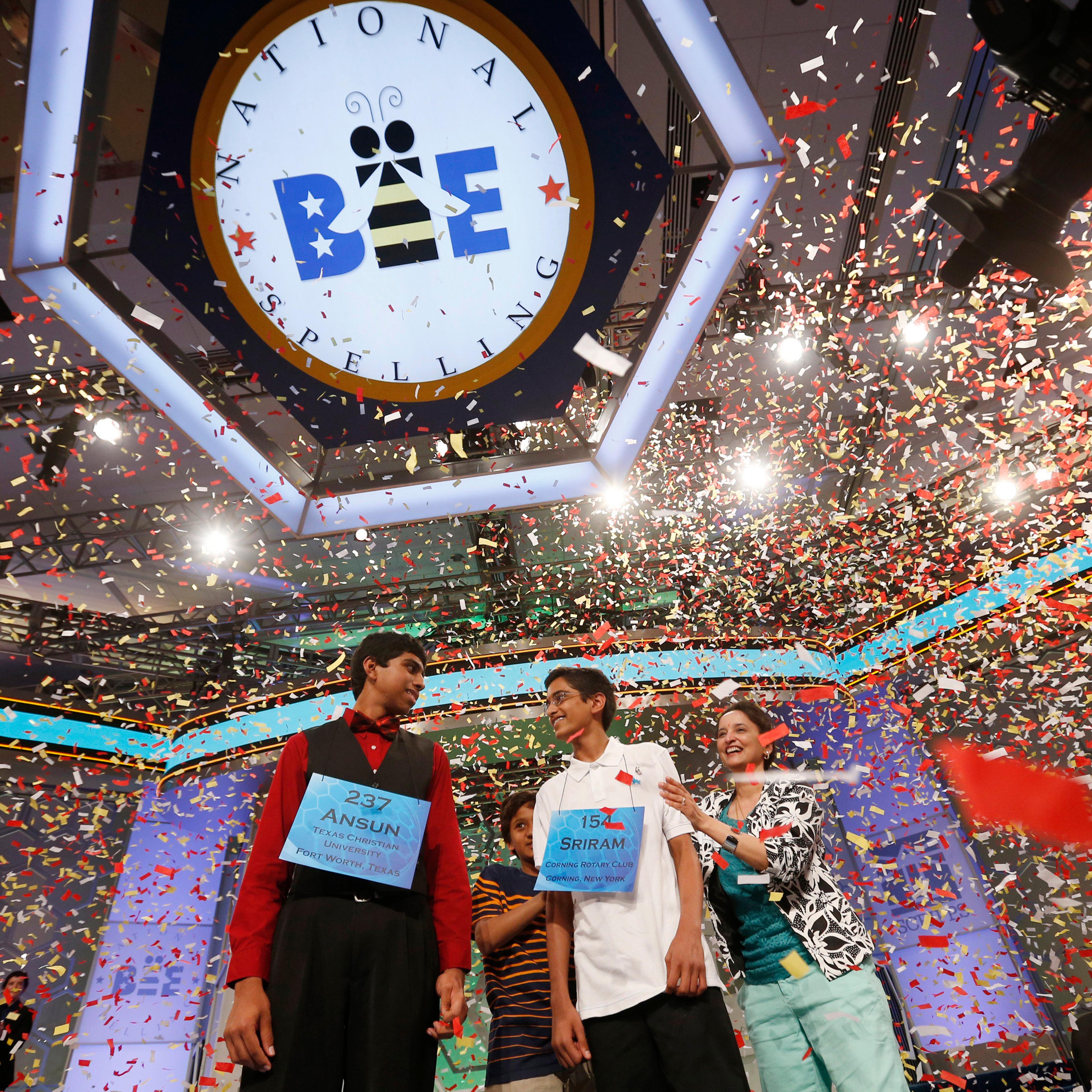 Hathwar stands next to his mother as he and Sujoe are joint winners of the 87th annual Scripps National Spelling Bee at National Harbor