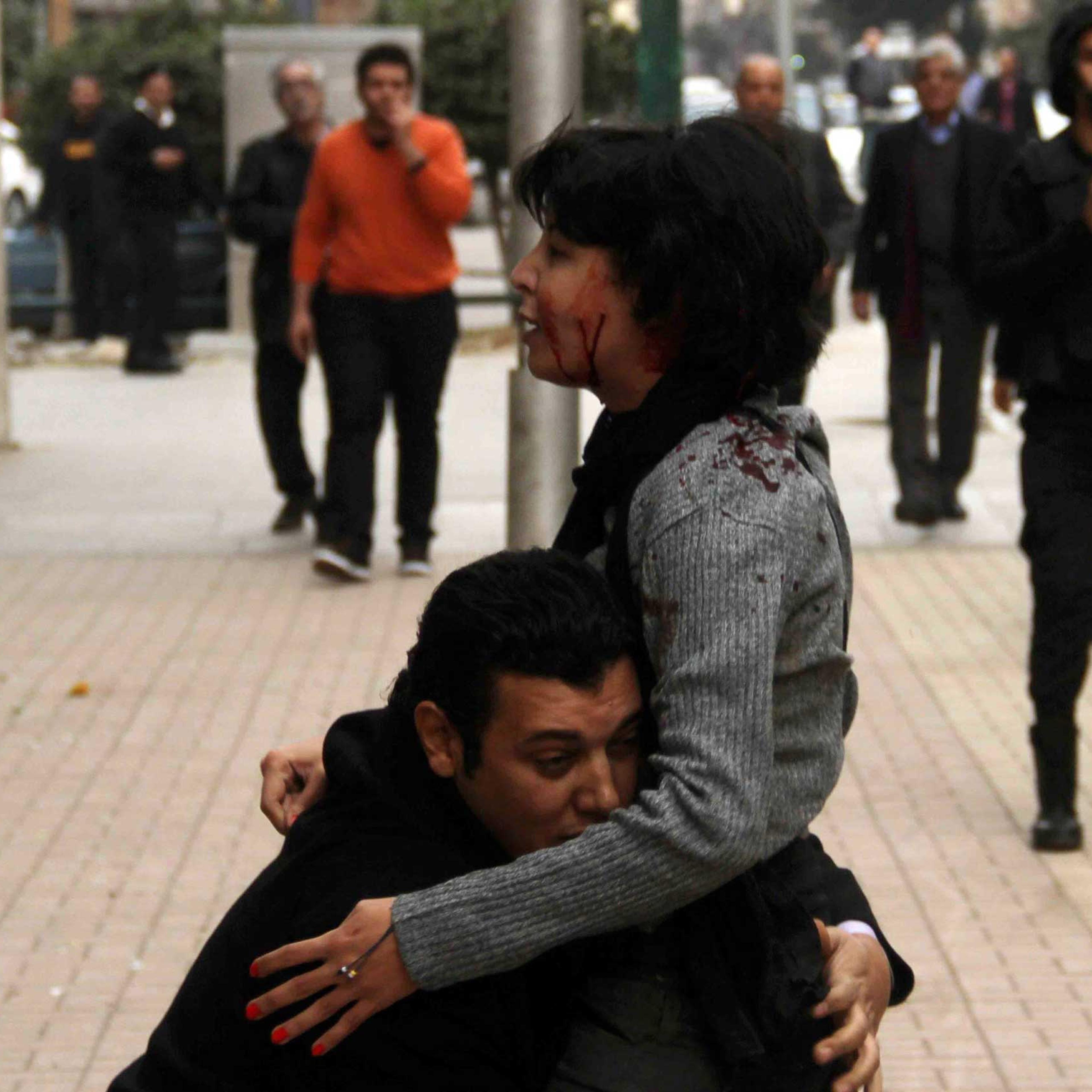 Socialist Popular Alliance Party activist Shaimaa al-Sabbagh receives help after she was shot during a protest by the party in Cairo, Jan. 4, 2015.