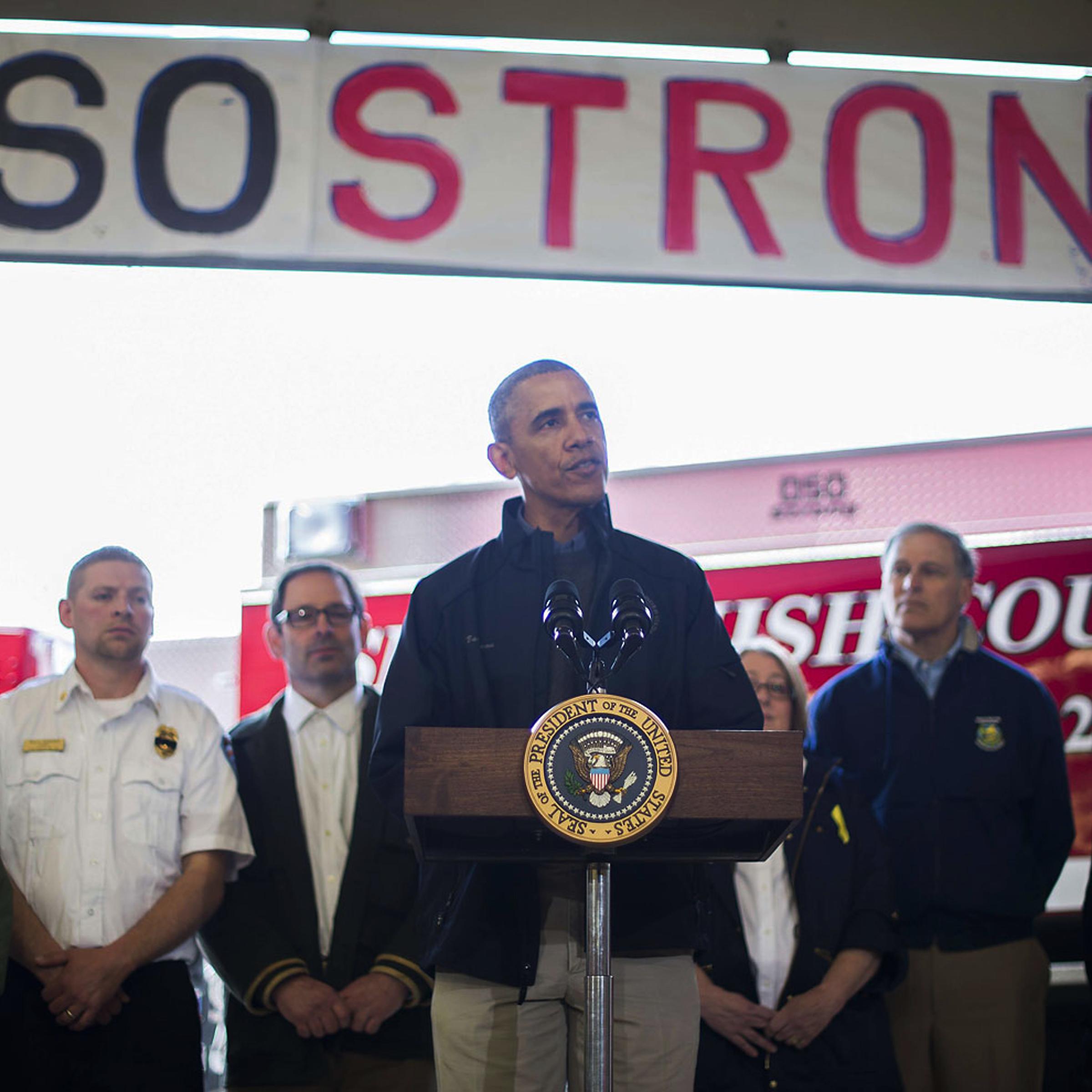US President Barack Obama delivers remarks at the firehouse in Oso, Washington, April 22, 2014, after touring the devastation left by a recent landslide.