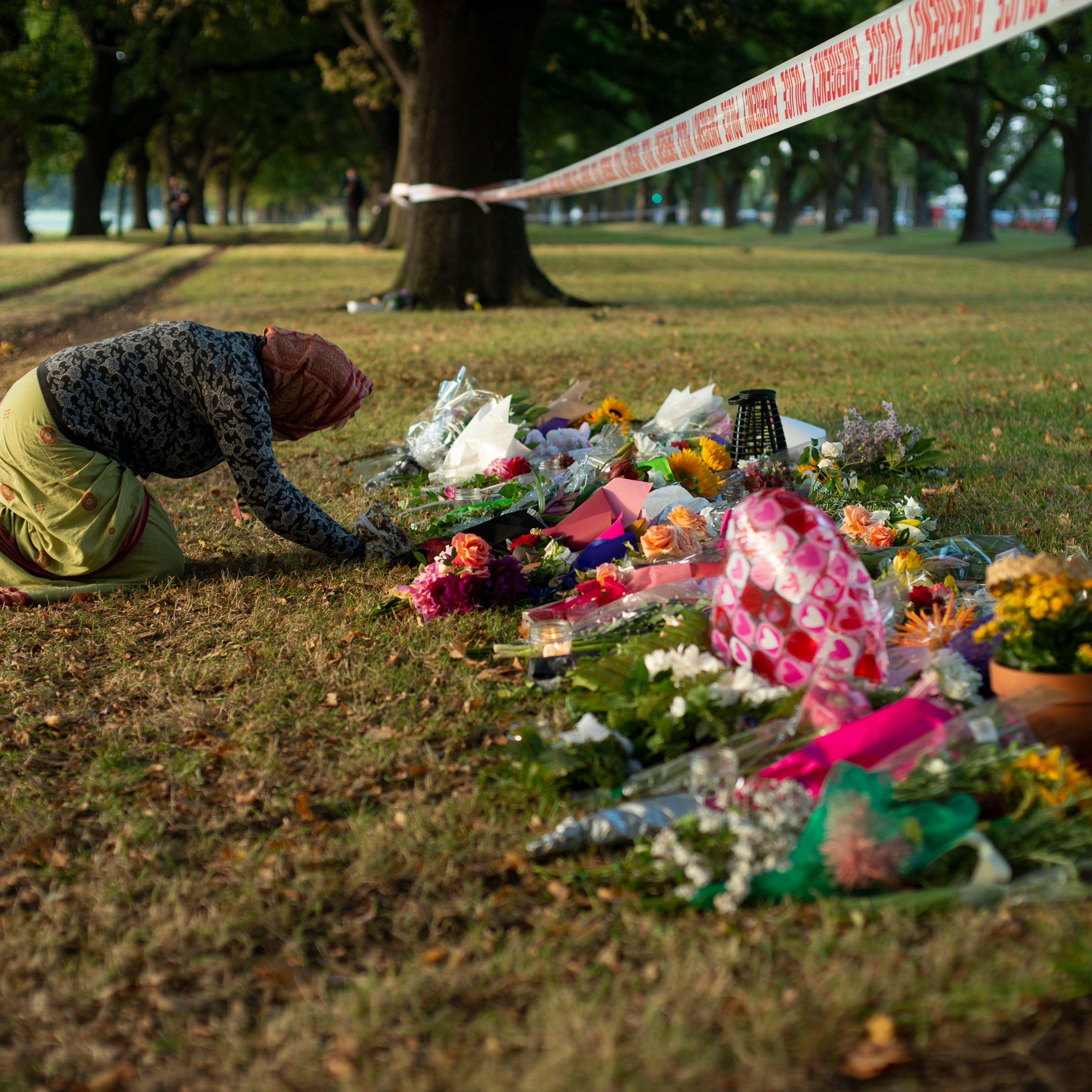 Early morning prayers at Masjid Al Noor Mosque memorial site in Hagley Park, where one of the two mass shootings occurred, Christchurch, New Zealand, March 17, 2019.